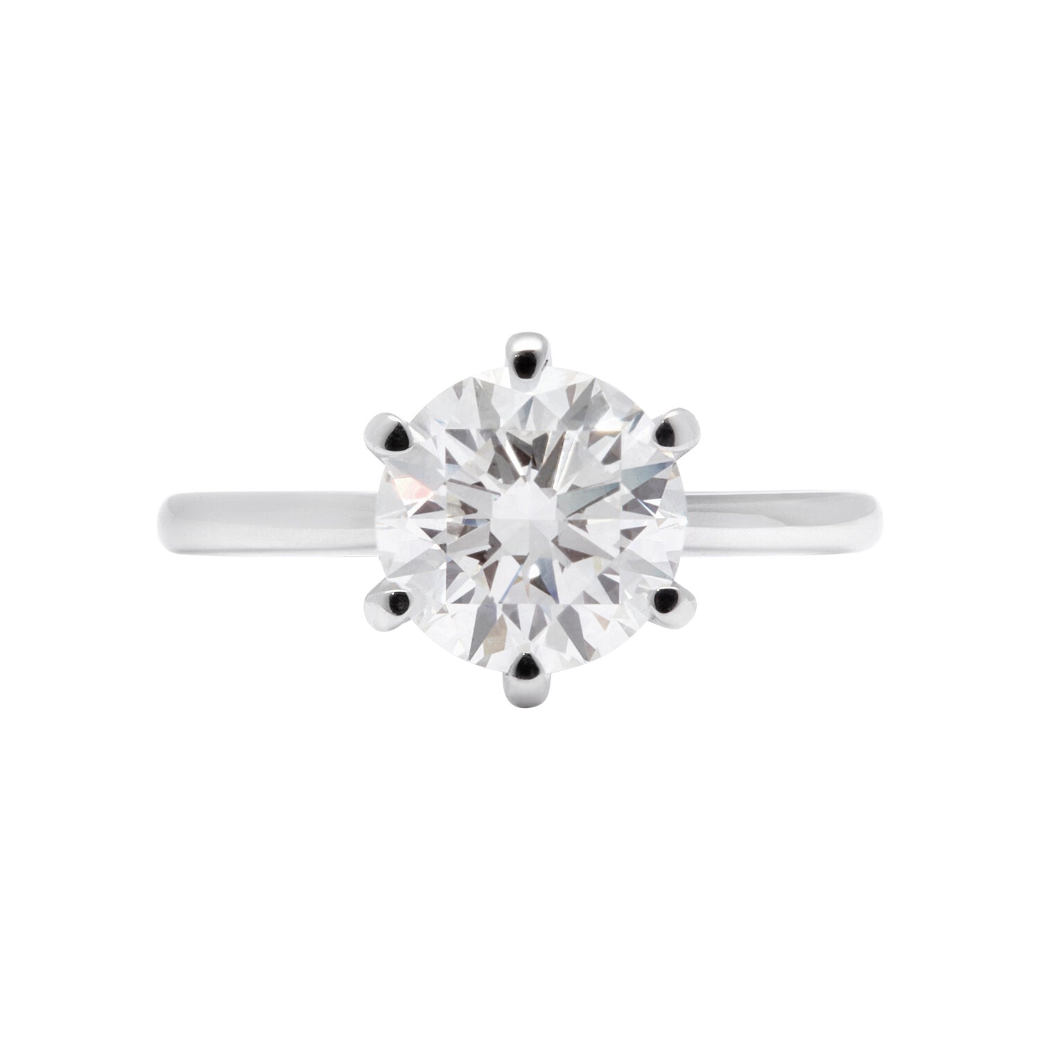 Faith Jewels Chantelle Engagement Ring – round brilliant solitaire diamond on a sleek white gold band with a six-prong setting