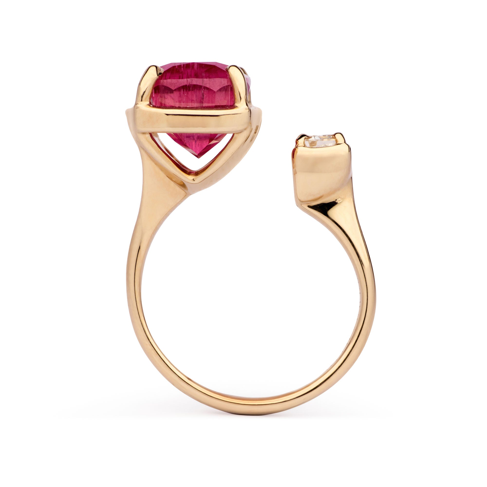Faith Jewels Toi Et Moi ring featuring a vivid magenta-pink 5.90ct rubellite and a 0.20ct trapezoid white diamond set in 9k yellow gold