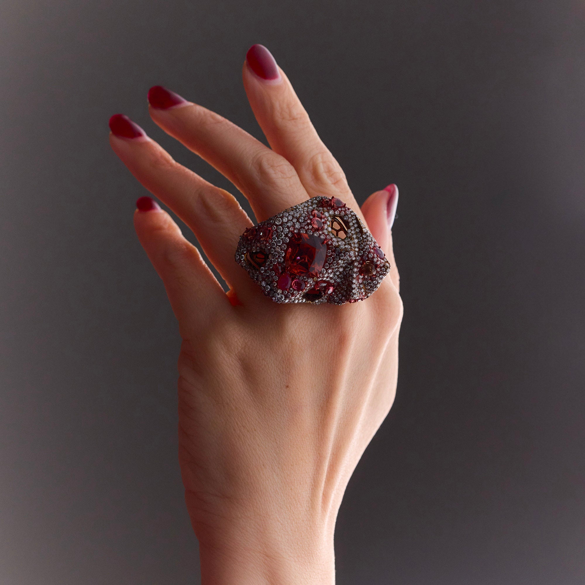 Luxury Earth Ring with tourmaline, rubies, padparadscha and orange sapphires, and diamonds in sculptural design