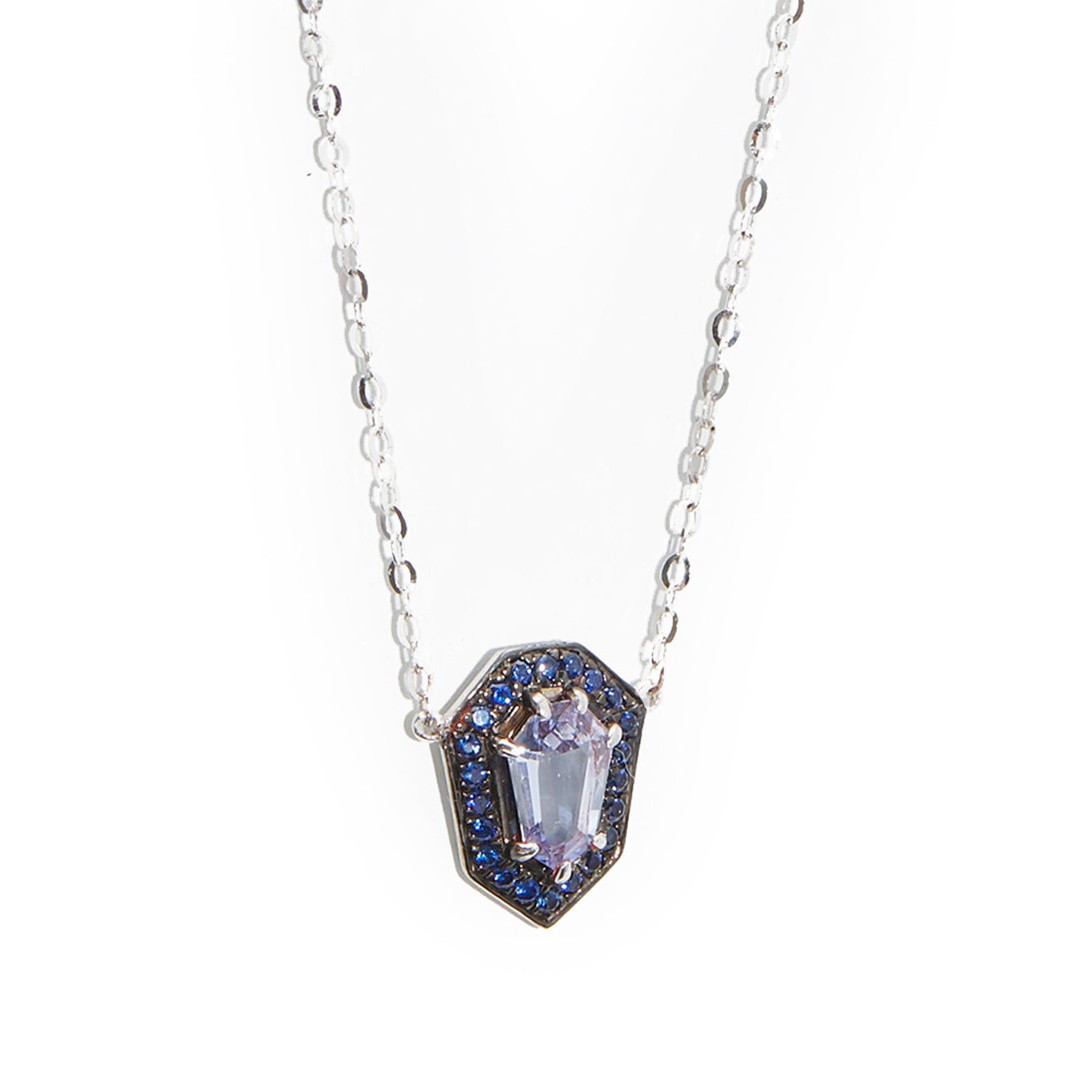 Dainty Kite Pendant Necklace in 18k white gold with 0.50ct light blue sapphire and halo of blue sapphires.