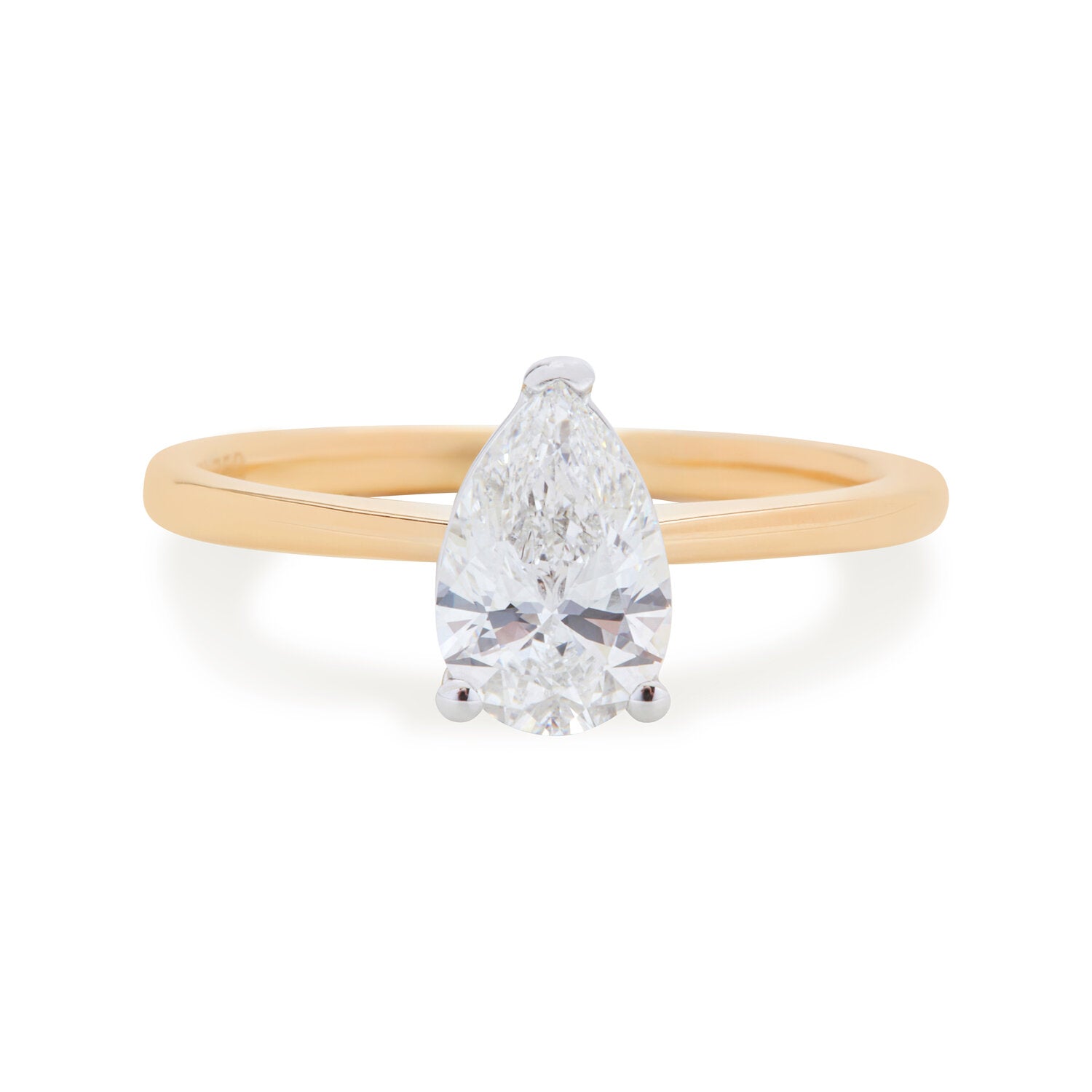 Faith Jewels Bridget Engagement Ring featuring a pear-shaped diamond held by a three-prong setting, elegantly set on a polished yellow gold band