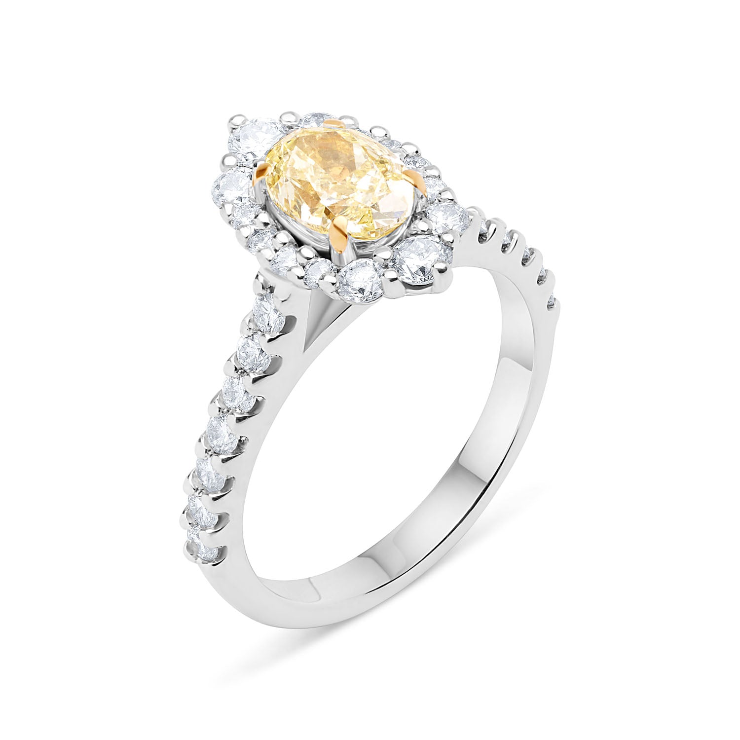 Faith Jewels Adeline yellow diamond engagement ring featuring an oval-cut yellow diamond with a graduating halo of round white diamonds, set in 18k white gold with a scallop-set diamond band