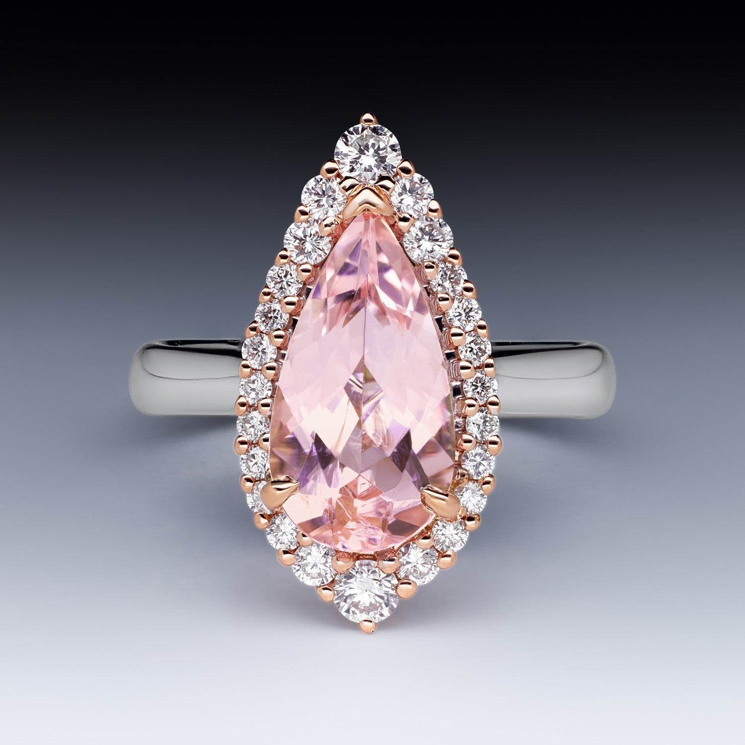 One of a Kind Adeline Morganite Engagement Ring featuring pear-cut pink morganite, round diamond halo, set in 18k rose and white gold.