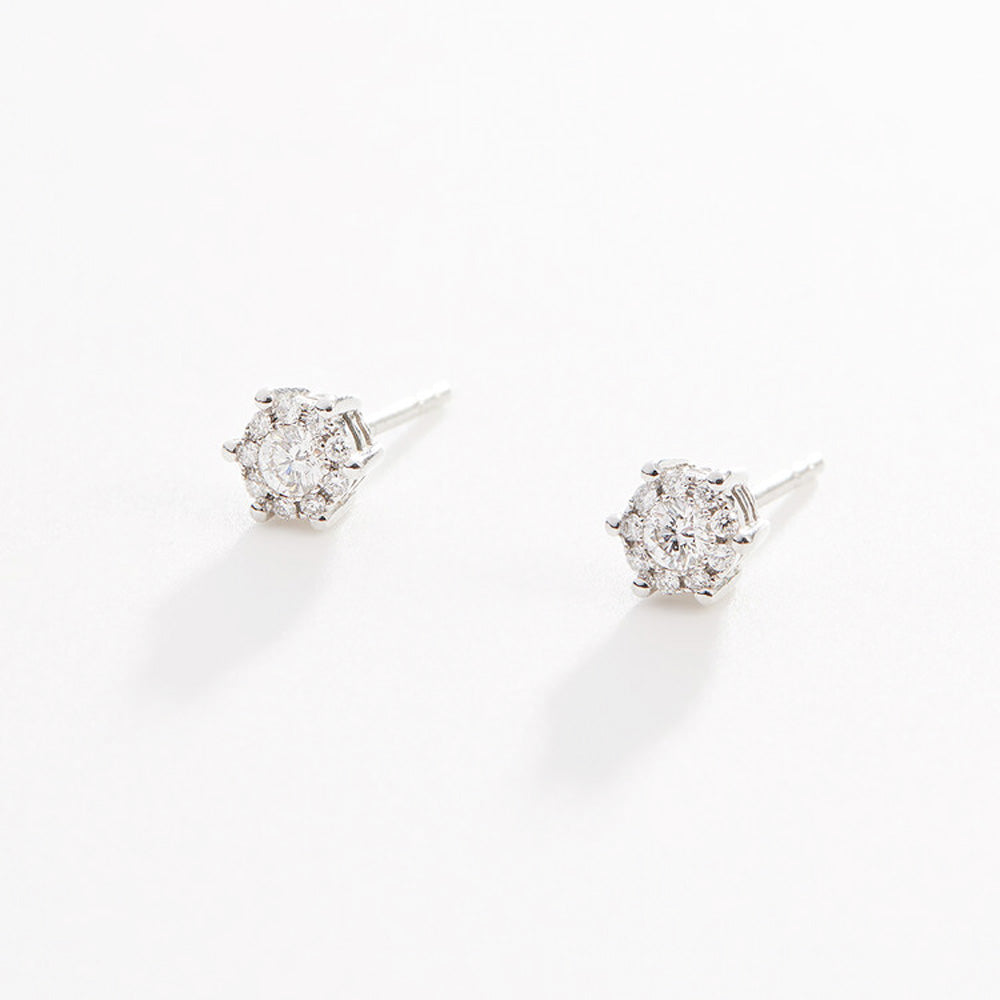 Faith Jewels Diamond Cluster Studs in 18k white gold featuring a central round diamond surrounded by pavé-set diamonds, totaling 0.20 carats