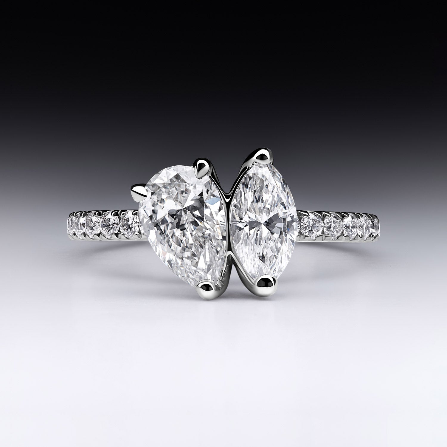 Faith Jewels Duetto Diamond Ring featuring pear-cut and marquise-cut diamonds with diamond shoulders in an 18k white gold setting