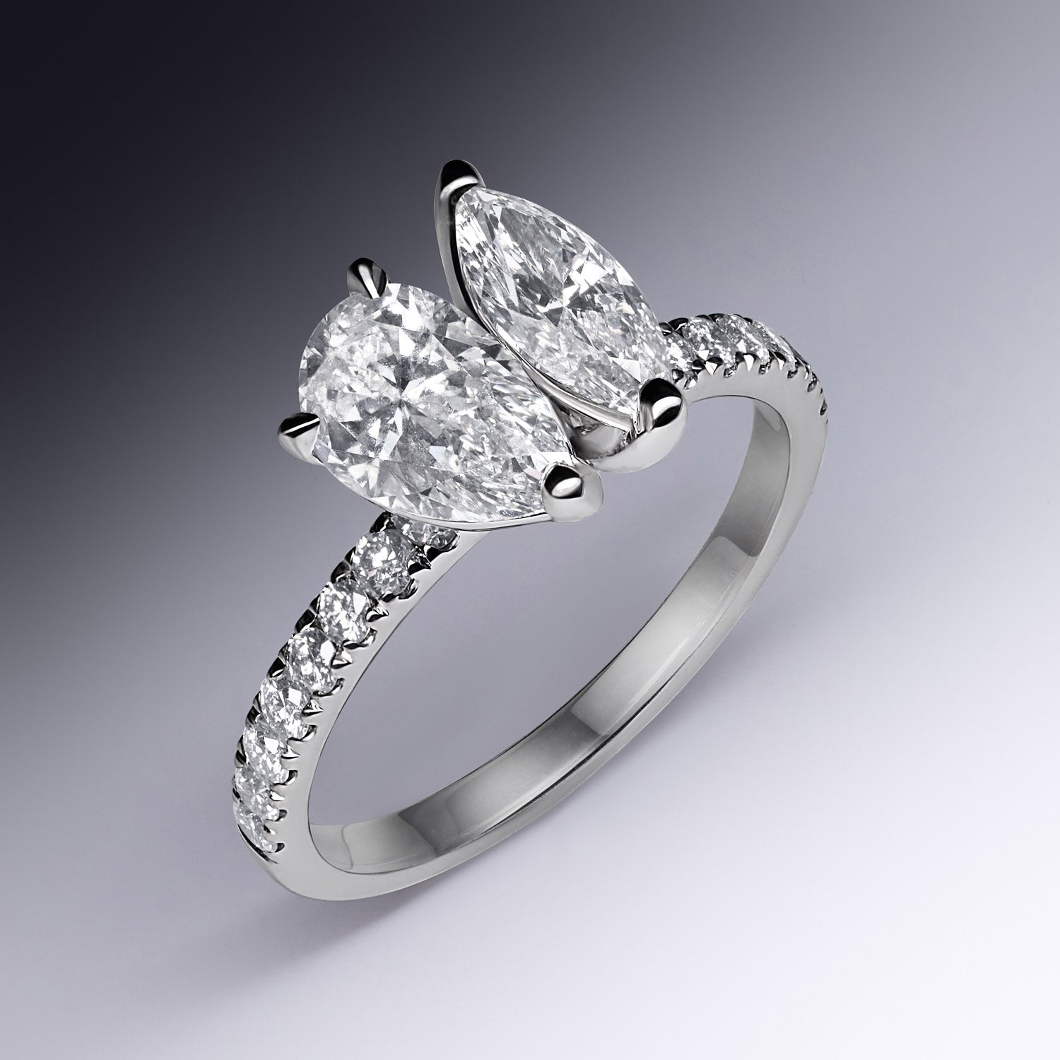 Faith Jewels Duetto Diamond Ring featuring pear-cut and marquise-cut diamonds with diamond shoulders in an 18k white gold setting