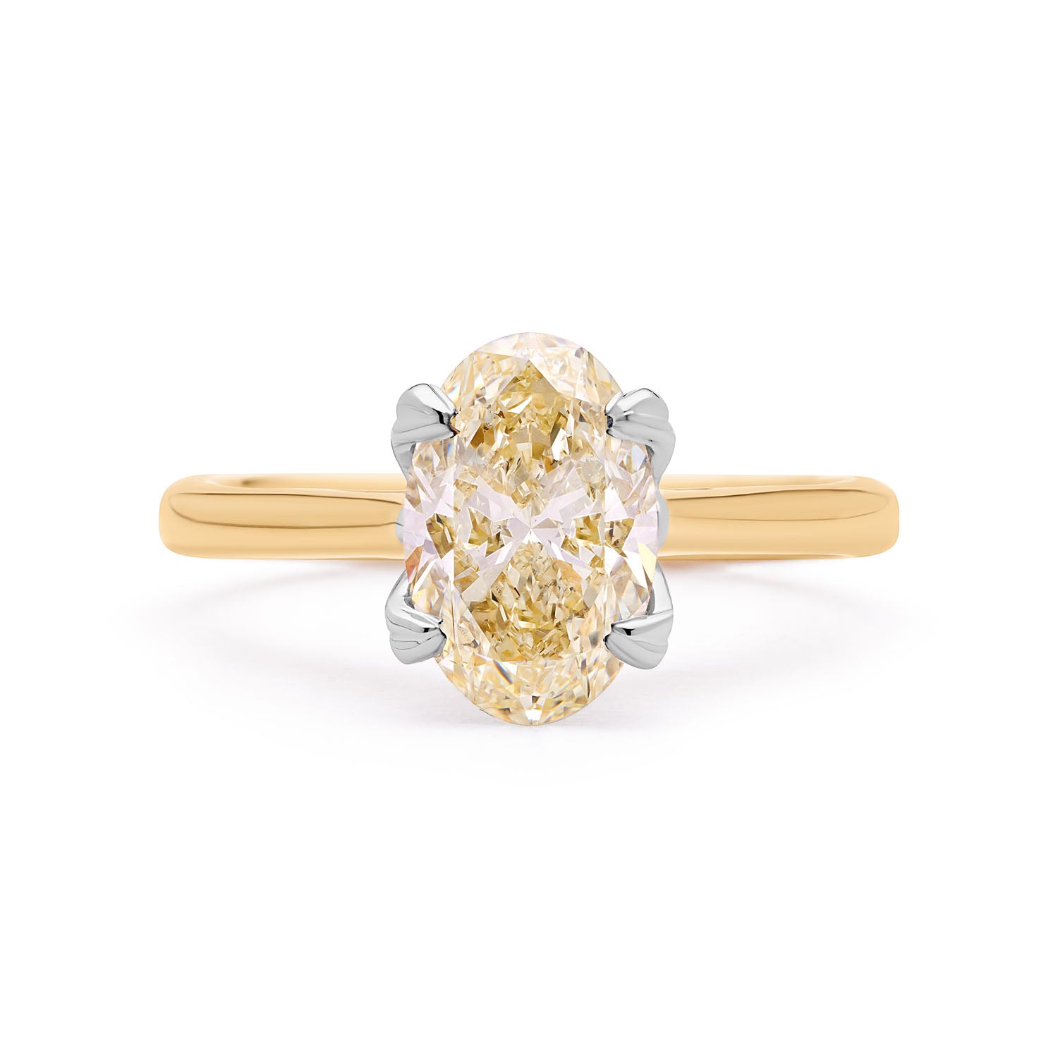 Faith Jewels Illume Yellow Diamond Engagement Ring featuring an oval-cut yellow diamond held by four white gold prongs, set on a polished yellow gold band