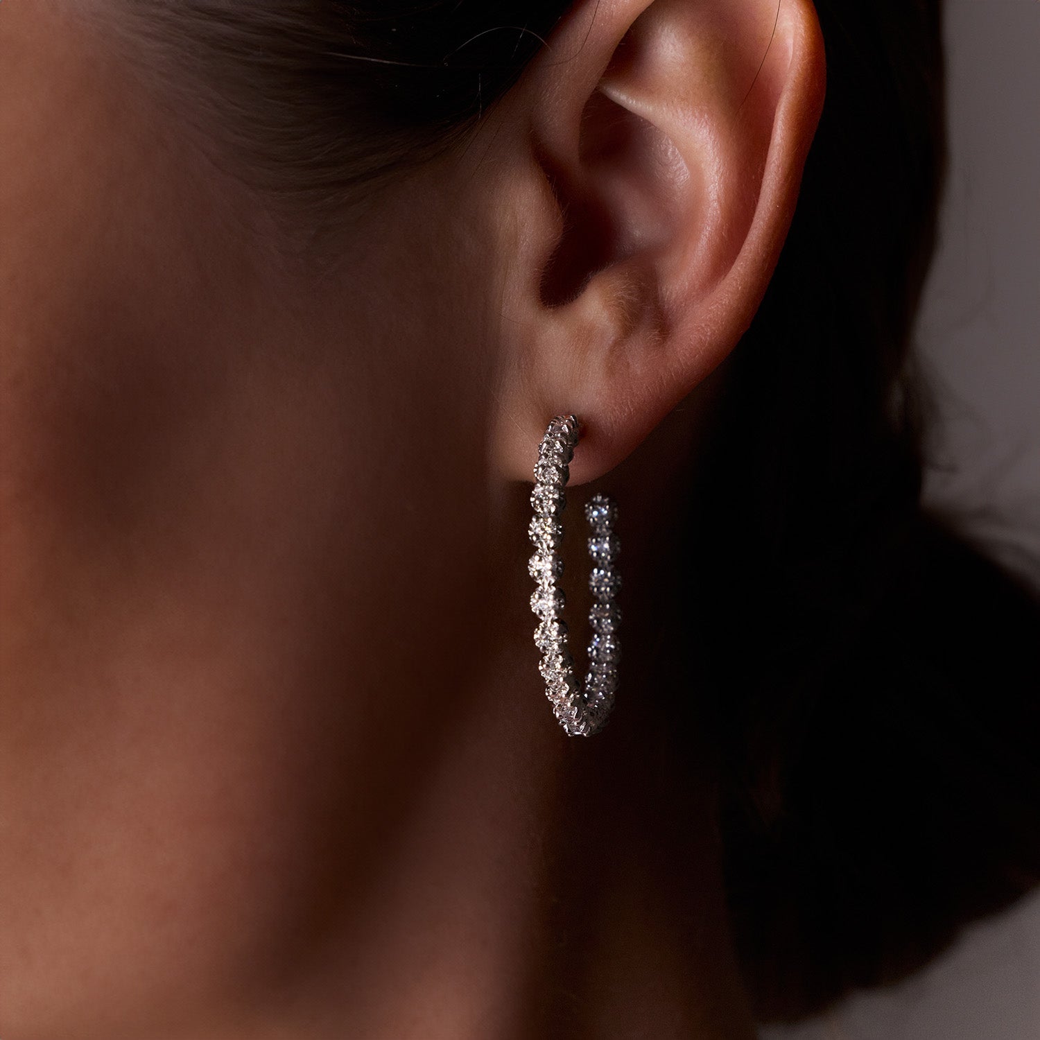 Faith Jewels Elegant diamond hoop earrings with diamonds set inside the hoop for maximum sparkle, enhanced by an illusion setting