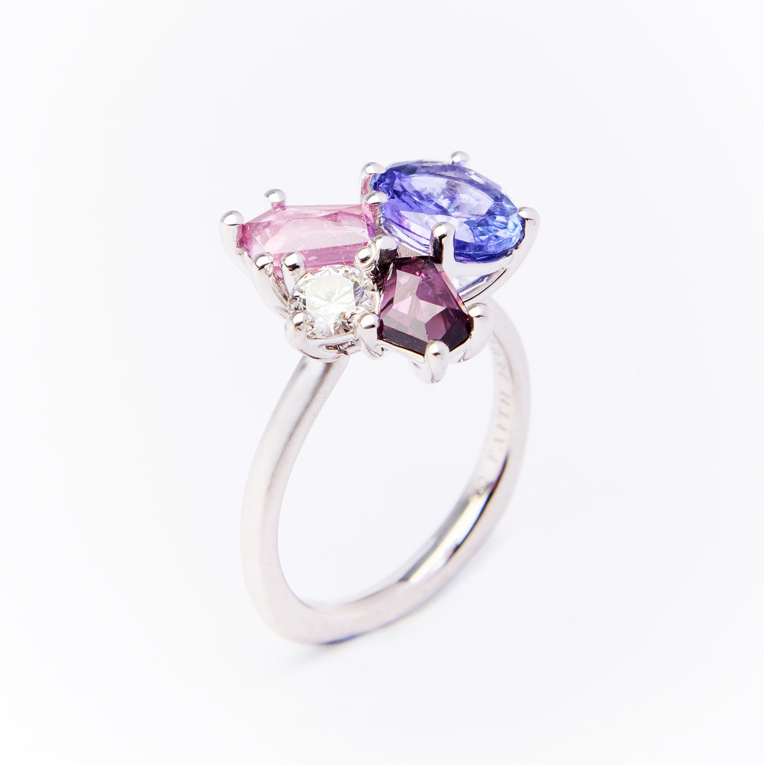 White gold ring from the Faith Jewels Bouquet Series featuring tanzanite, blush spinel, purple spinel, and an heirloom diamond