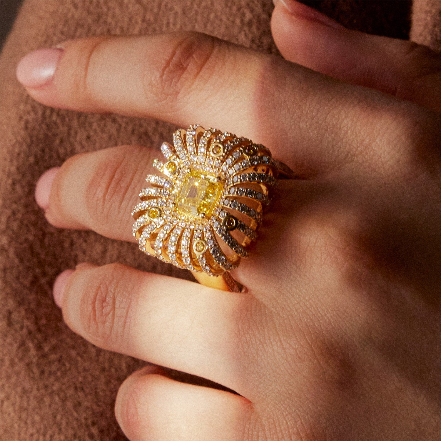 Faith Jewels Mirragio yellow diamond ring with cascading diamonds radiating from a central yellow diamond, inspired by Egyptian and Italian heritage