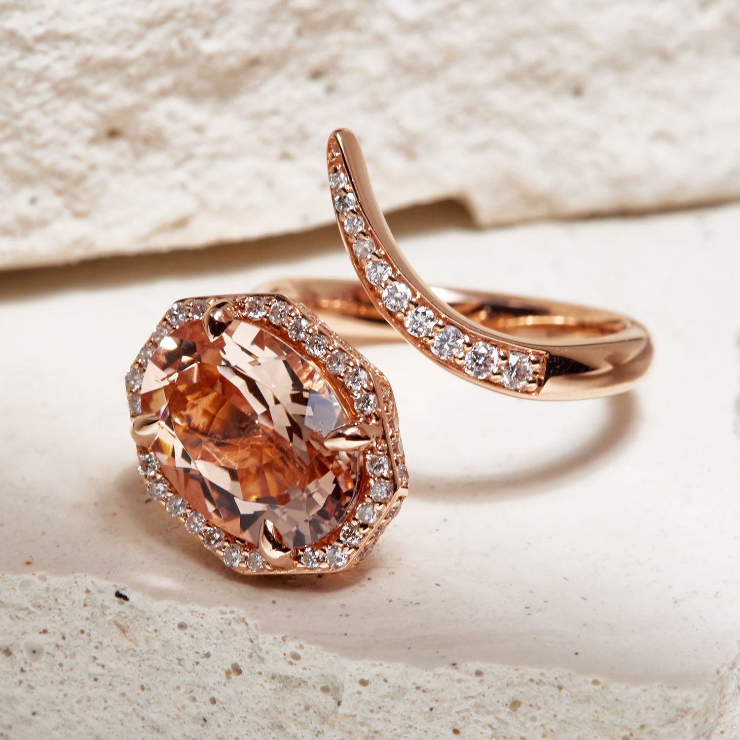 Faith Jewels Serpenti ring in 18k rose gold featuring a pink morganite center surrounded by a halo of white diamonds