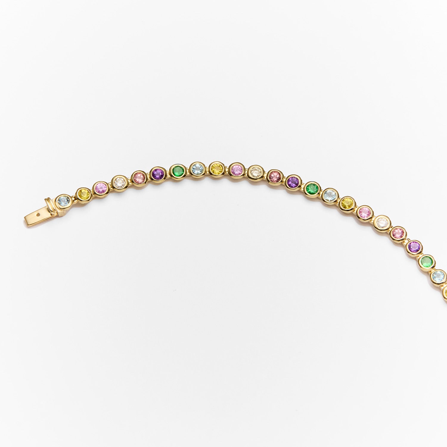 Faith Jewels Rainbow Tennis Bracelet featuring a vibrant mix of aquamarine, sapphires, white diamonds, garnet, peach, and amethyst gemstones totaling 2.80 carats, set in a sleek yellow gold chain