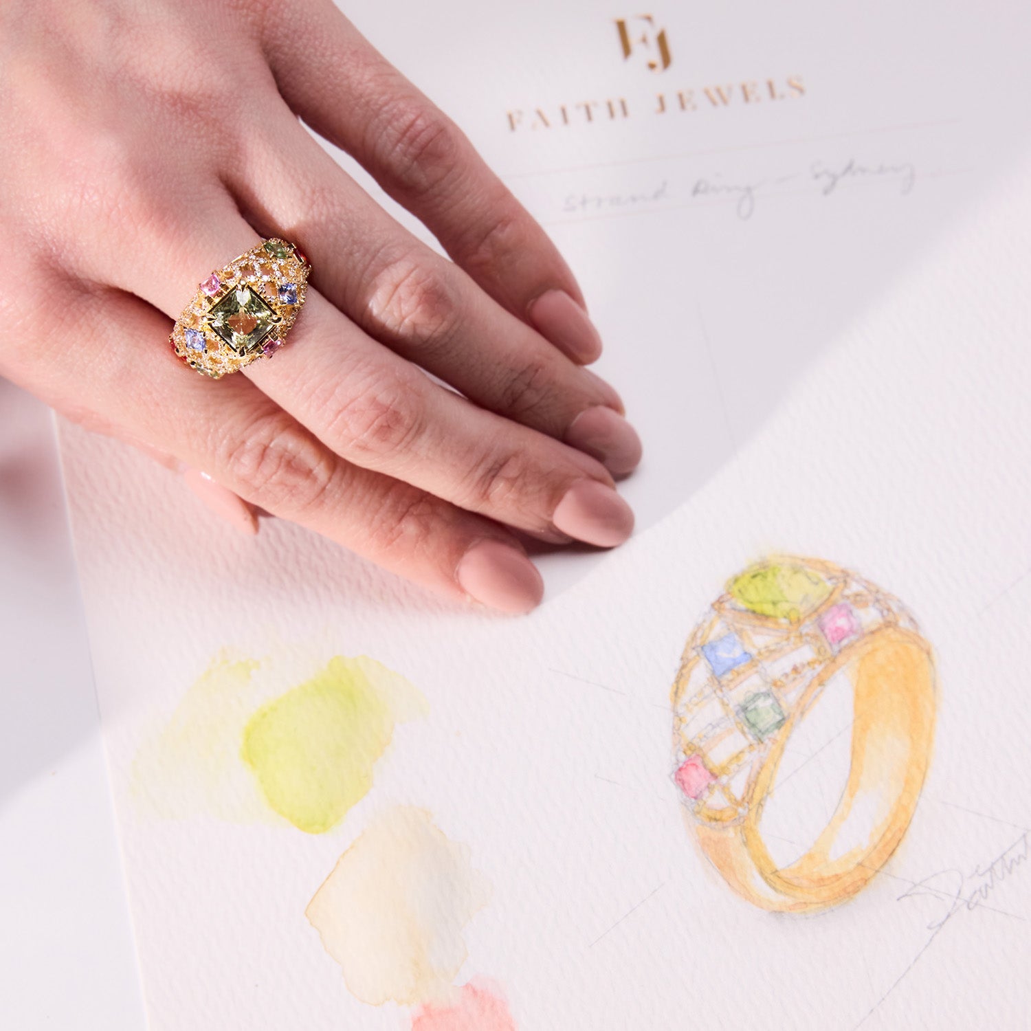 Statement dome gold ring featuring pink, blue, orange, and green gemstones with sparkling diamonds, bold and colourful design.