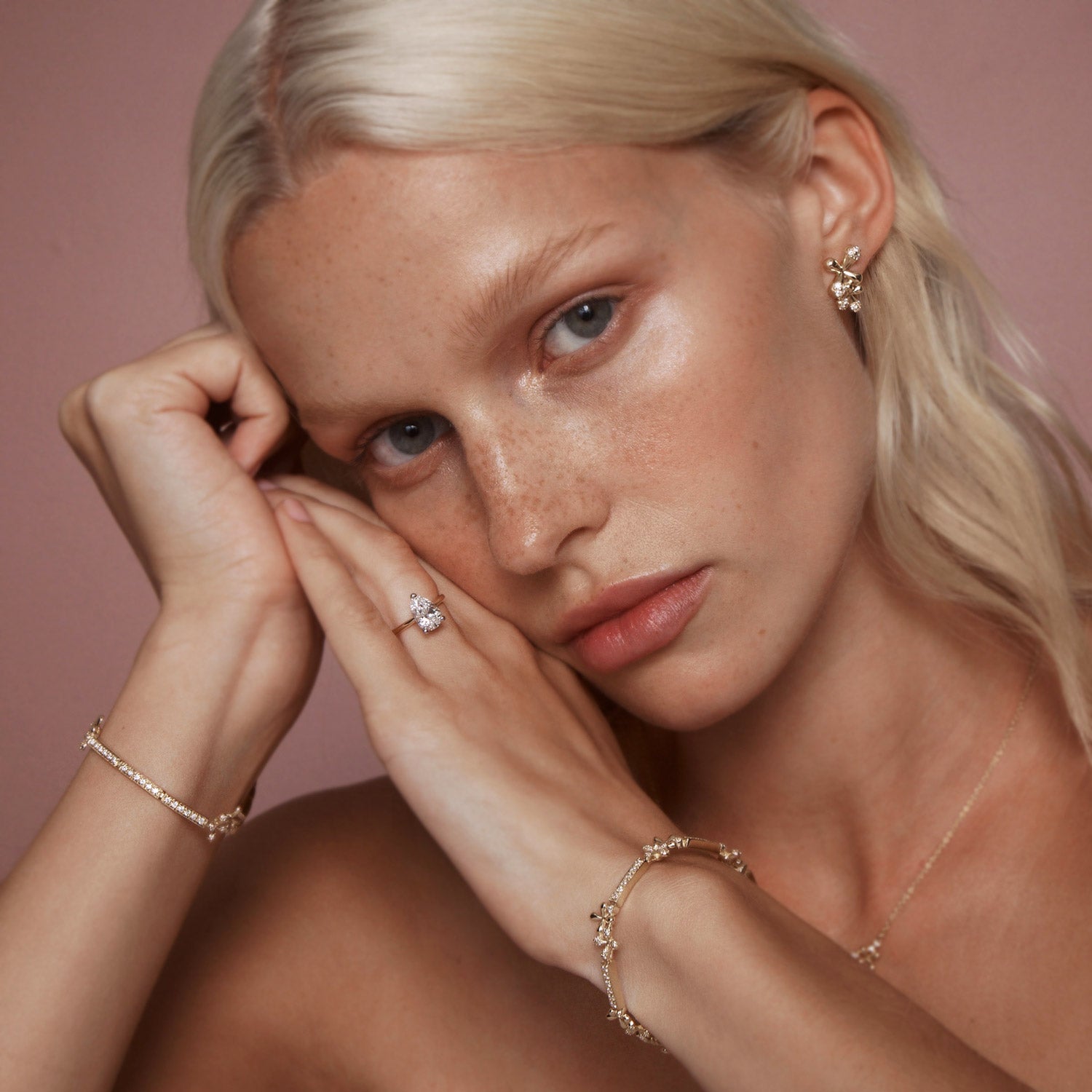 Wildflowers Diamond Bracelet in 18k yellow gold with 0.50ct diamonds and stylised floral motifs, worn on model.