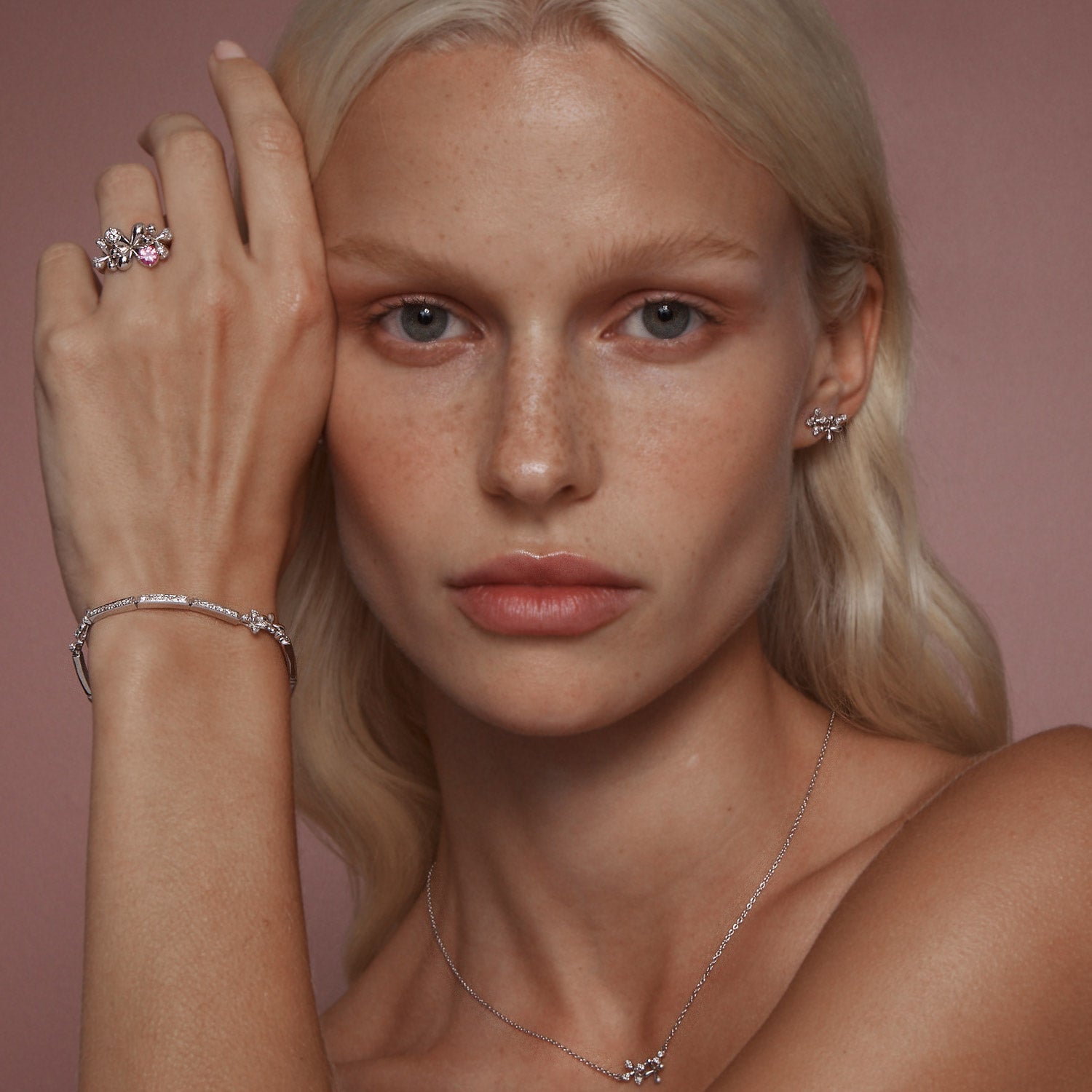 Wildflowers Diamond Bracelet in 18k white gold with 0.50ct diamonds and stylised floral motifs, worn on model.