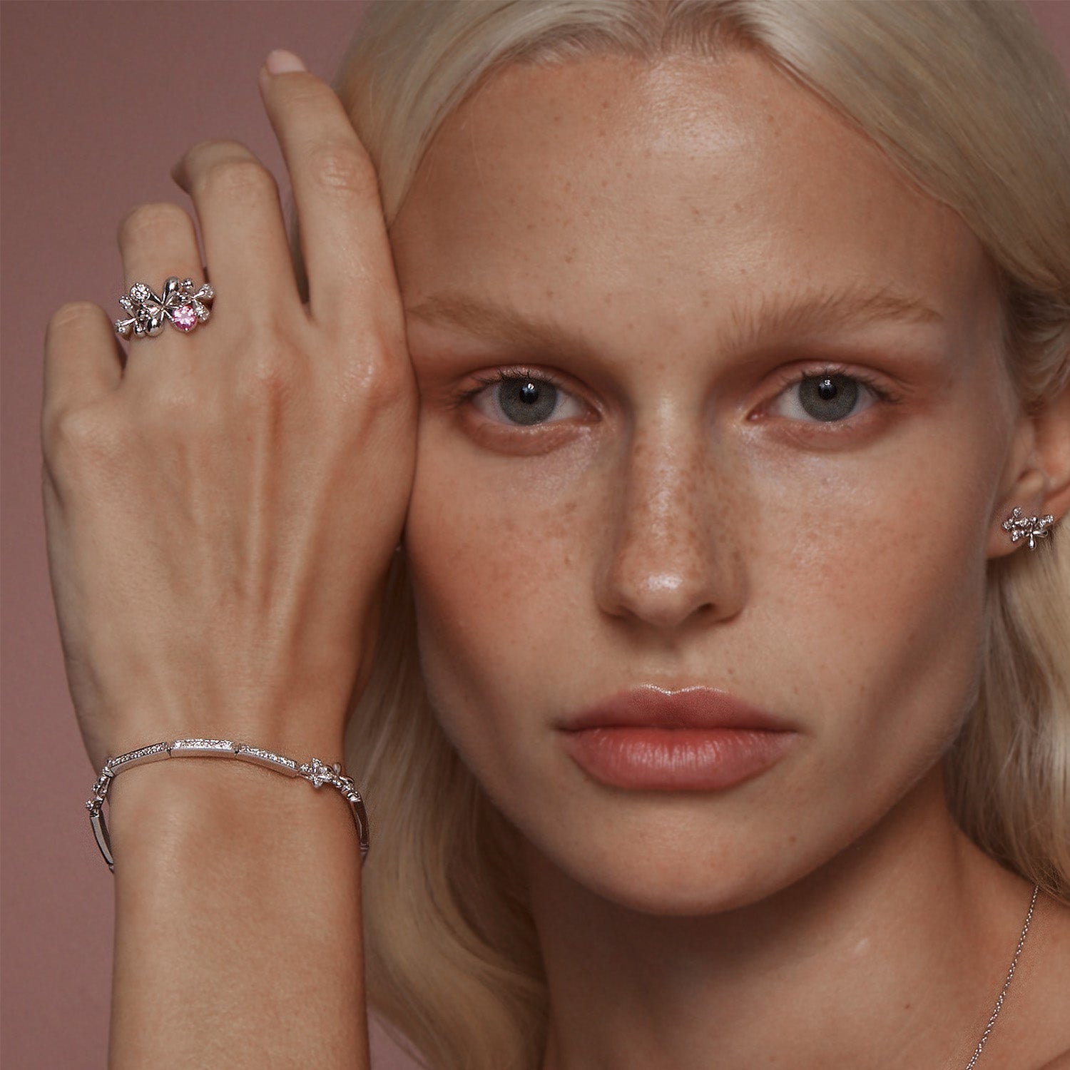 Pink Sapphire and Diamond Ring in 9k white and yellow gold with 0.40ct pink sapphire and 0.35ct diamonds, worn on model.