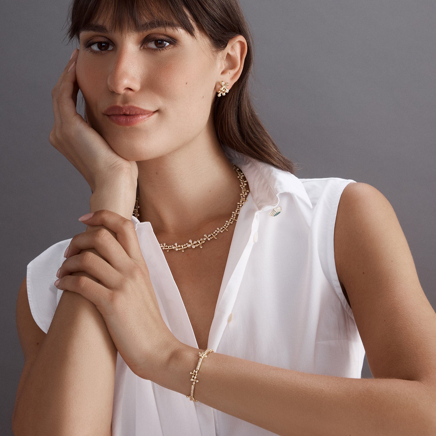 Wildflowers Full Diamond Bracelet in 18k yellow gold with 1.00ct over 100 round brilliant diamonds and floral motifs, worn on model with Wildflowers collection.