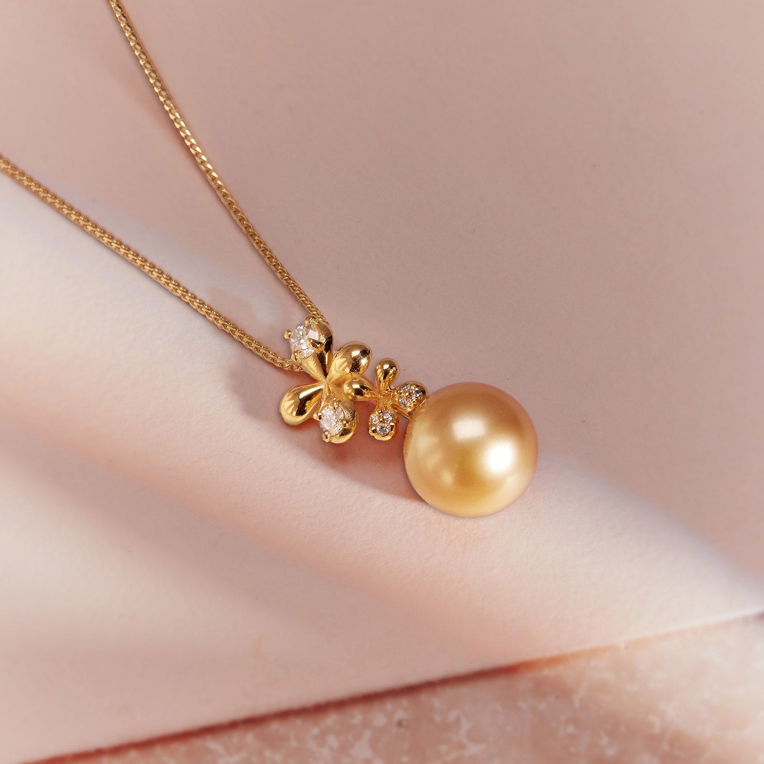 Diamond South Sea Pearl Pendant in 18k yellow gold with 0.46ct diamonds, floral motifs, and a golden South Sea pearl.