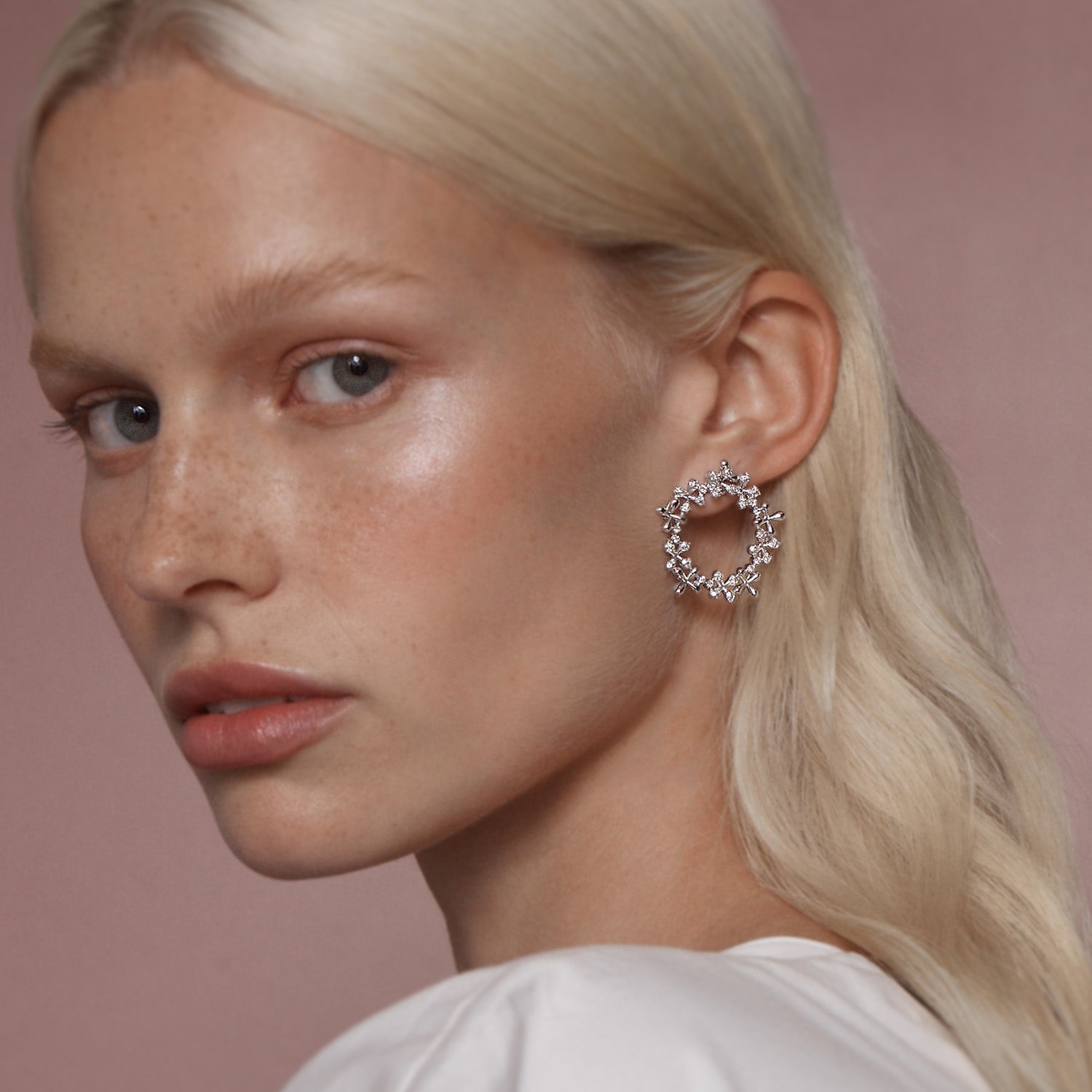 Diamond Wreath Earrings in 18k white gold with 1.00ct total diamonds and stylised floral motifs, worn on model.