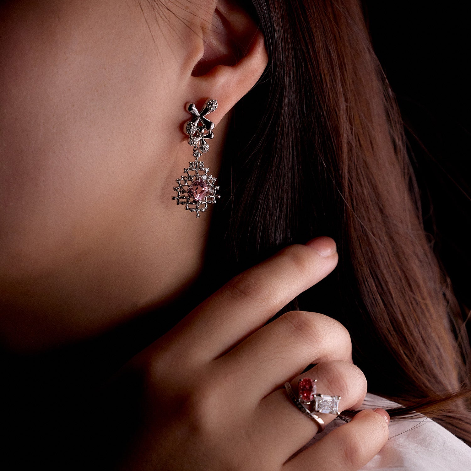 Faith Jewels Pink tourmaline pendant and earrings set in 18k white gold with diamond floral accents on model