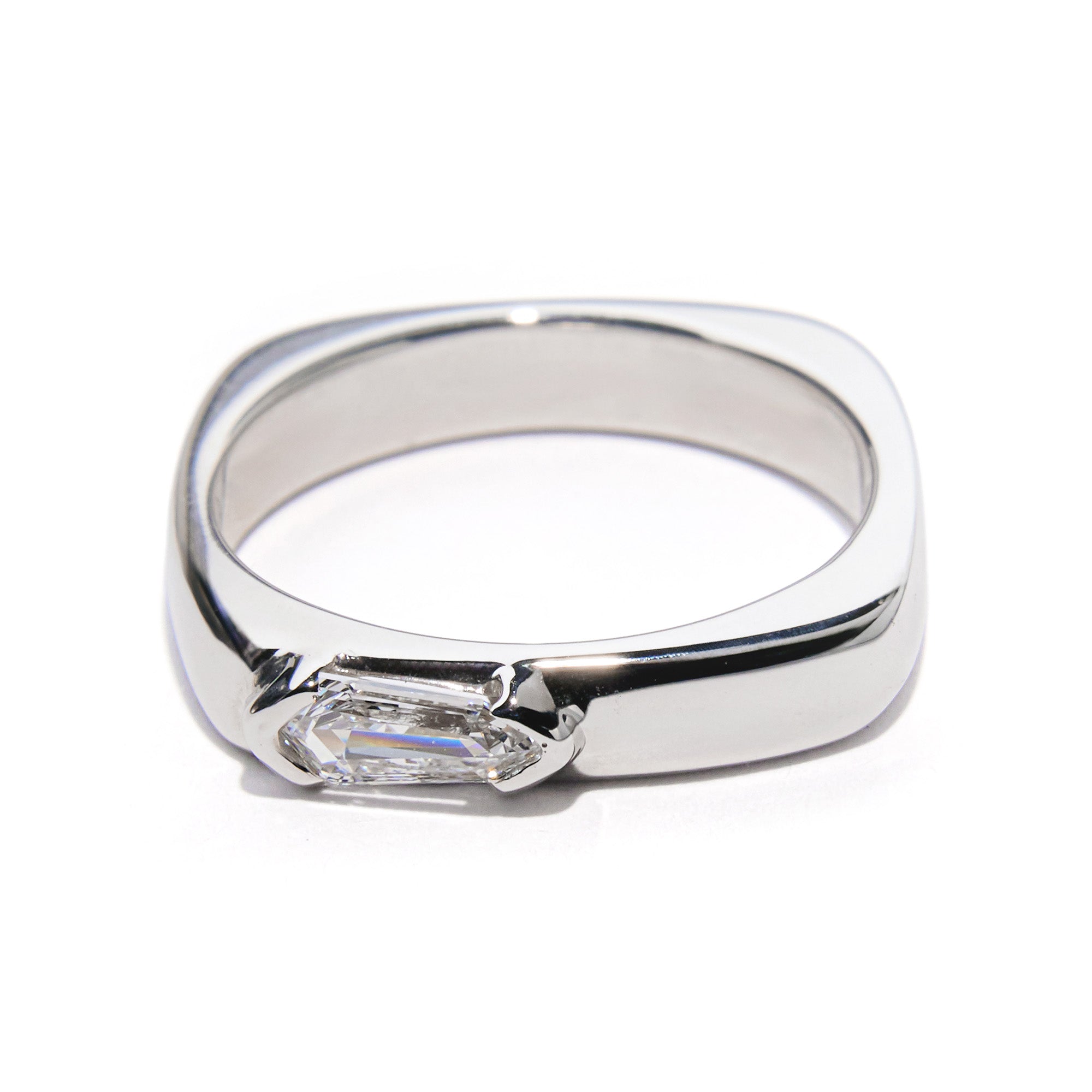 Kite-shaped diamond signet ring in 18k white gold with modern geometric design