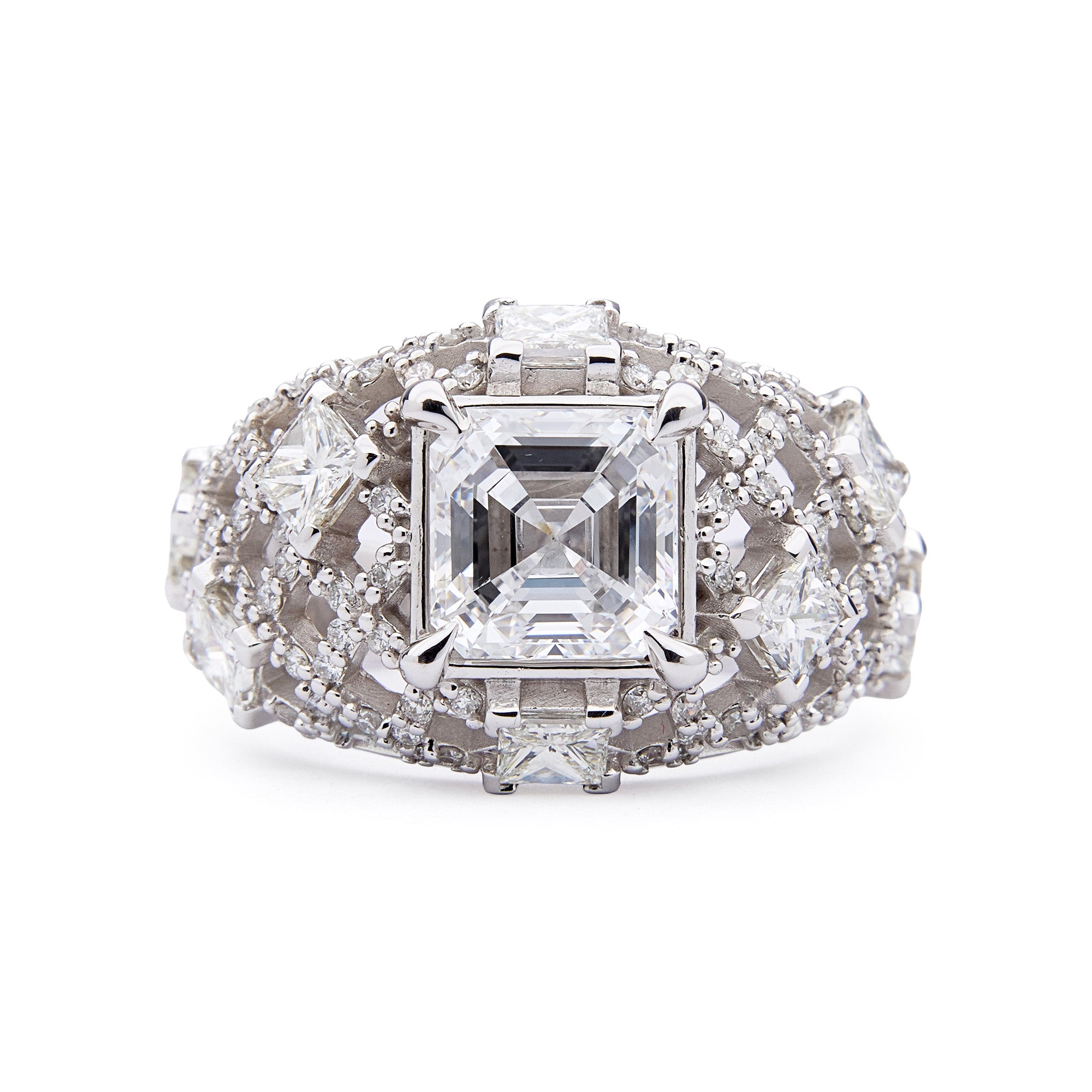 Pantheon Ring in white gold with emerald-cut diamond and architectural lattice of brilliant diamonds