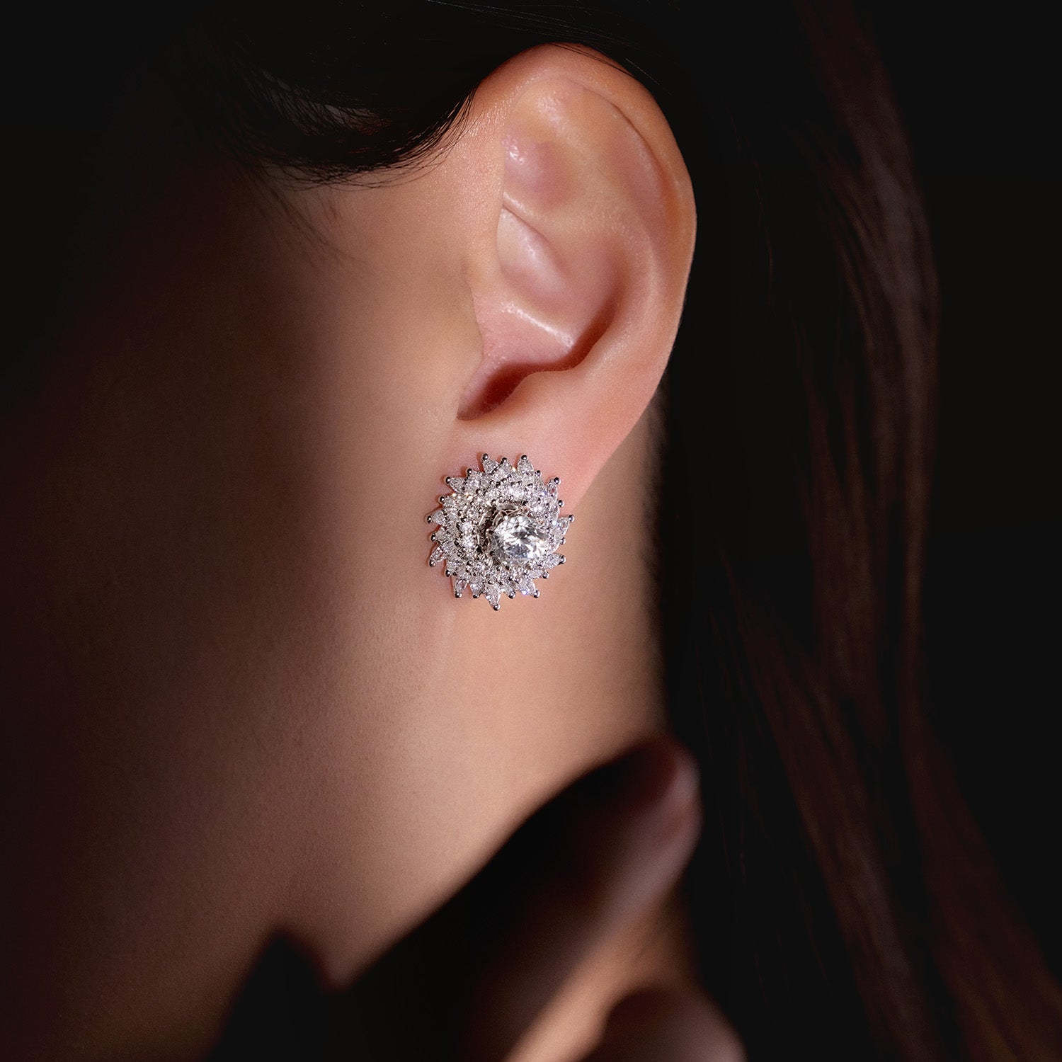 Faith Jewels White gold sunburst halo earring enhancers with round and marquise-cut diamonds, designed to frame diamond studs.