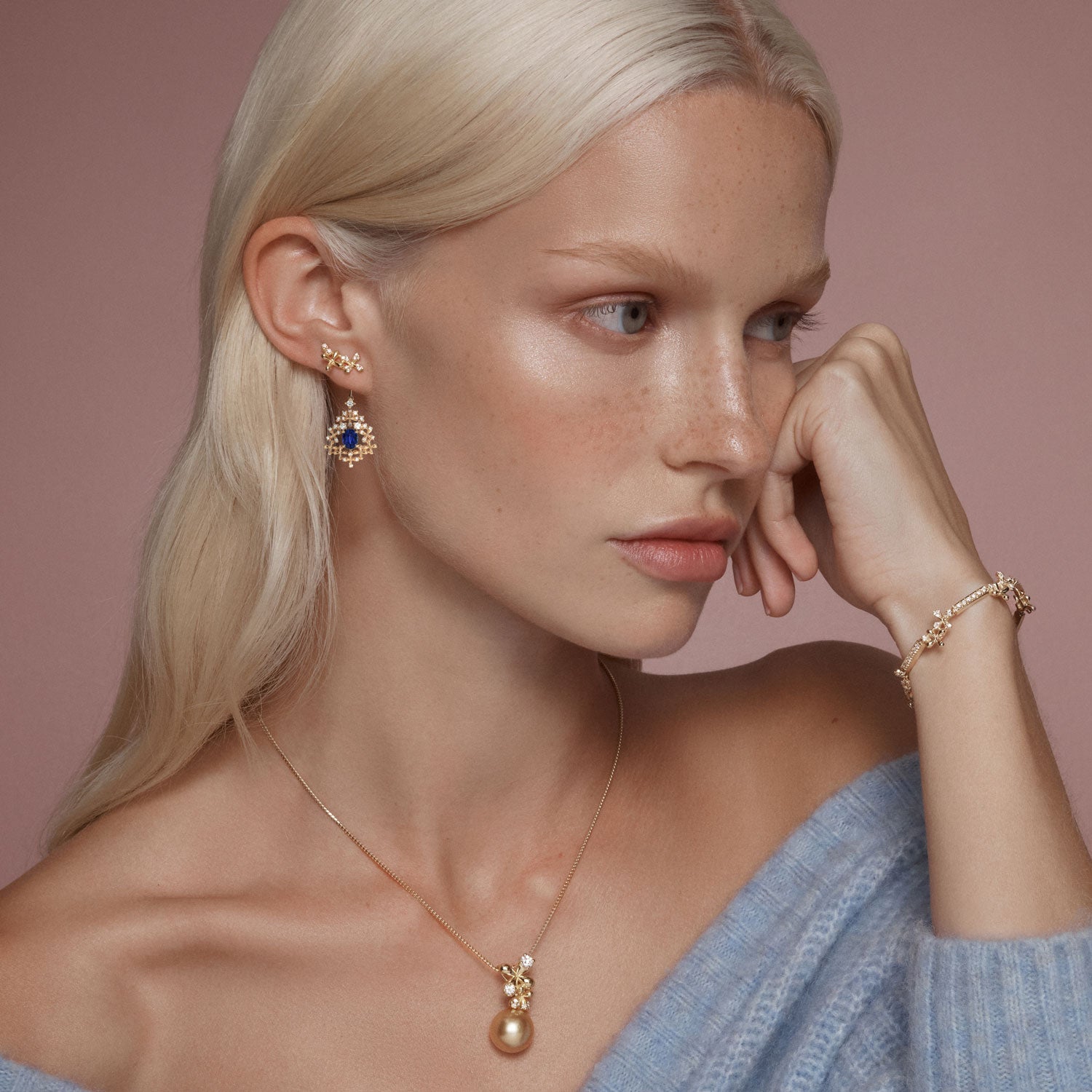 Wildflowers Grandiflora Blue Sapphire Enhancers in 18k yellow gold worn on model with matching Wildflowers necklace and bracelet.