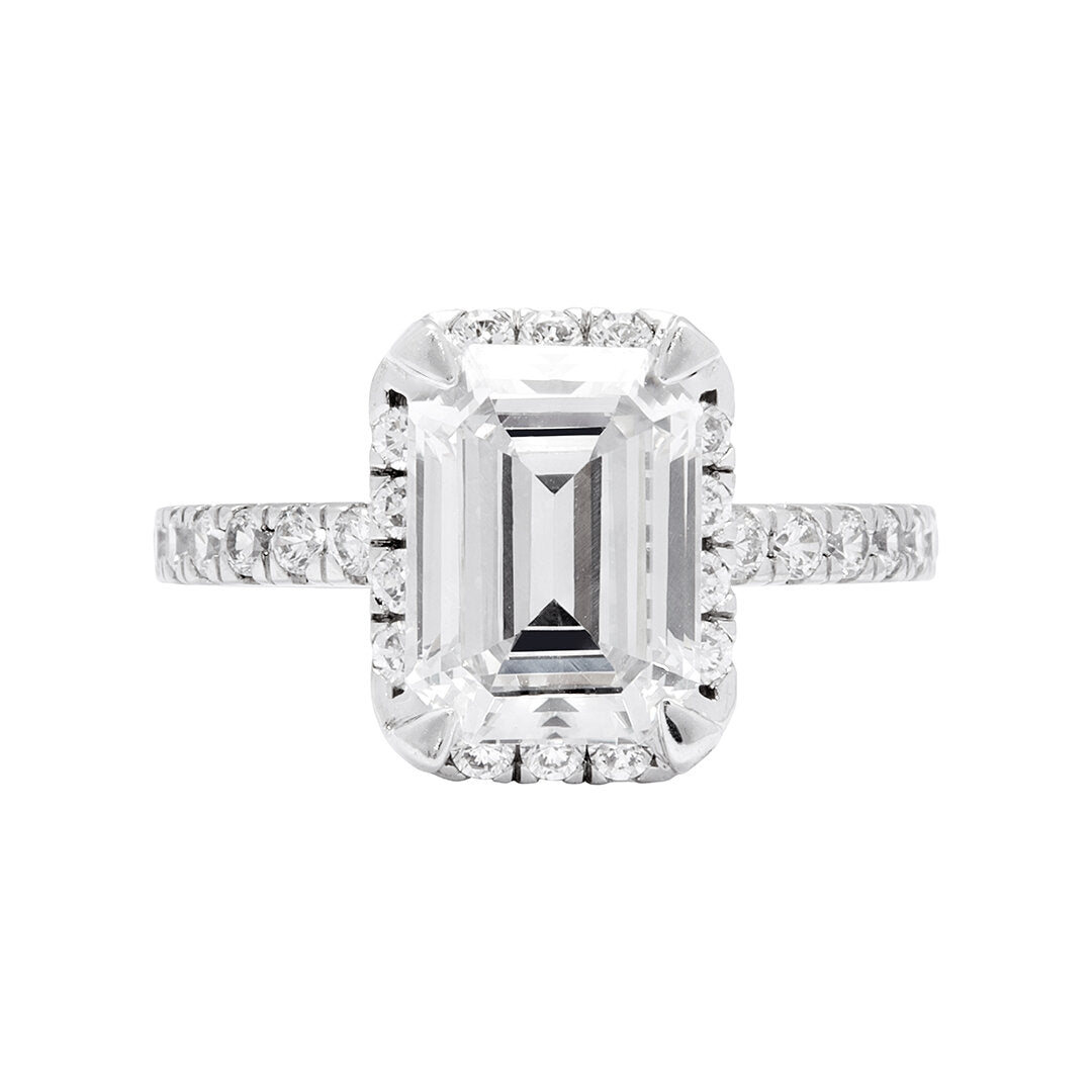 Faith Jewels Sophie diamond engagement ring featuring an elongated central diamond surrounded by a delicate diamond halo, set on a fine diamond-encrusted band