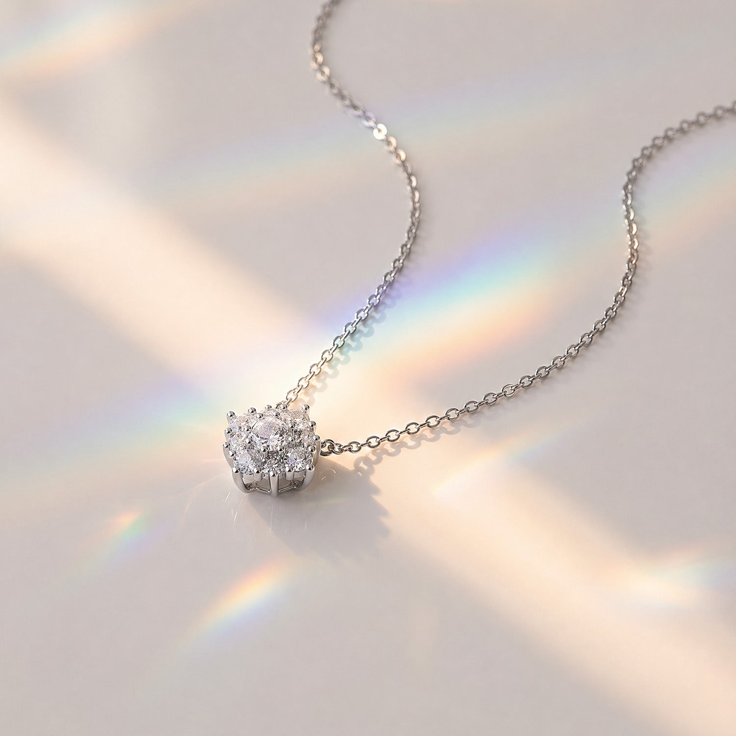 Mini snowflake diamond pendant necklace white gold, round diamond cluster snowflake design elegant everyday fine jewellery