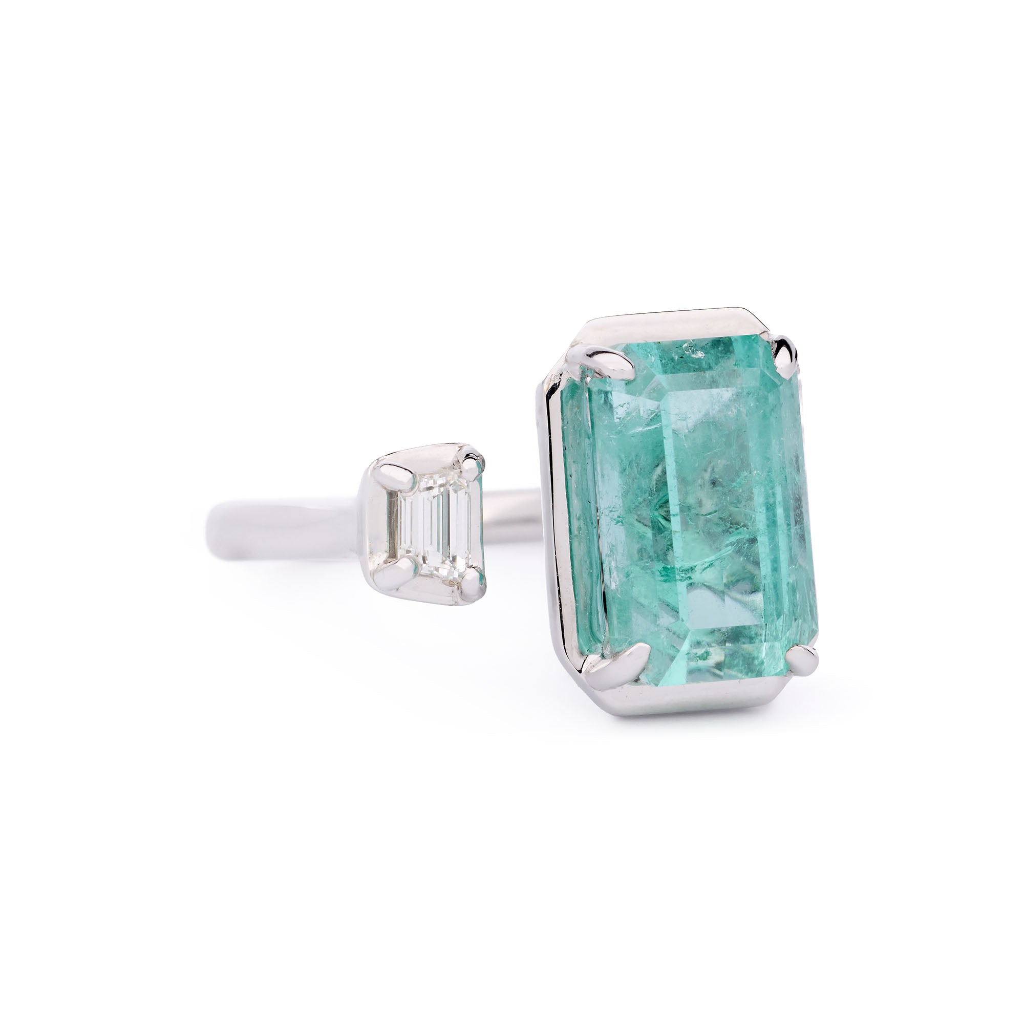 Faith Jewels Toi Et Moi ring showcasing a 7.25ct lagoon-blue tourmaline paired with a 0.20ct trapezoid white diamond, set in 9k white gold