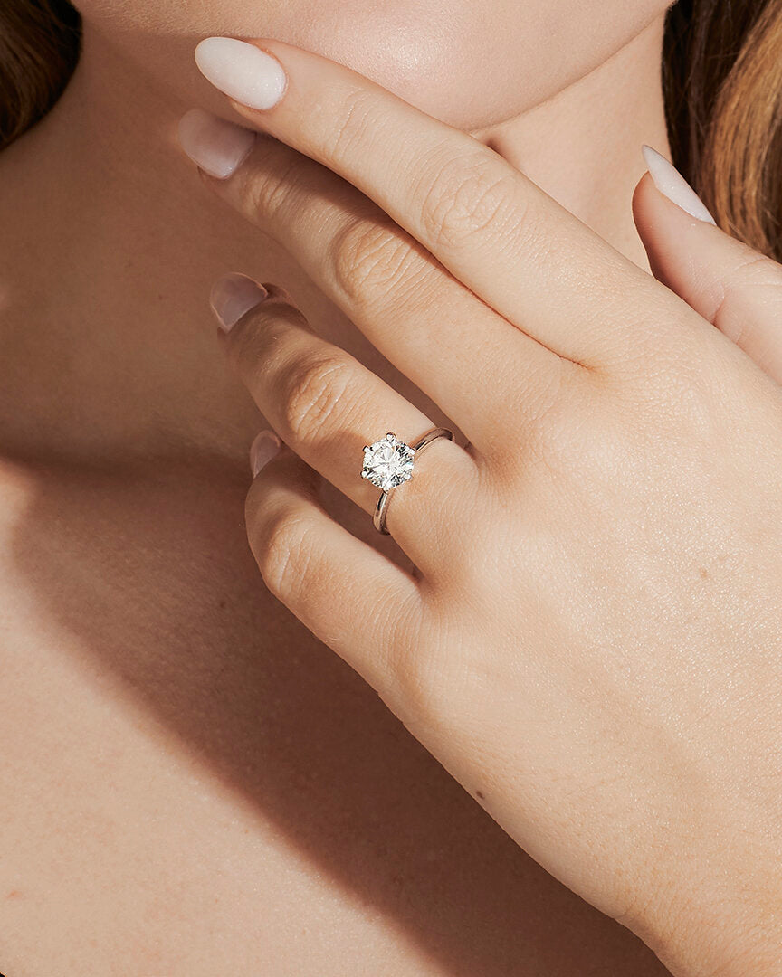 Faith Jewels Chantelle Engagement Ring – round brilliant solitaire diamond on a sleek white gold band with a six-prong setting