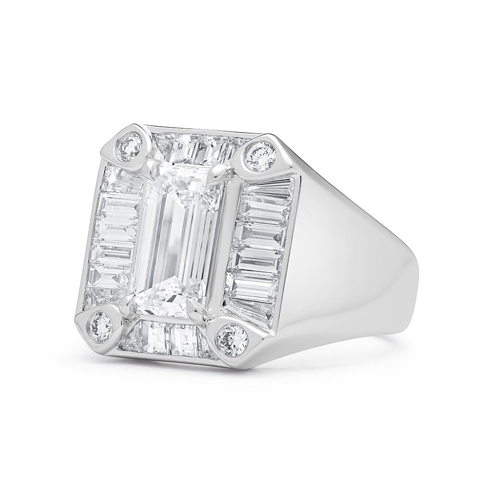 Faith Jewels White gold Gent Signet ring featuring a 1.50ct emerald-cut diamond surrounded by baguette diamonds.