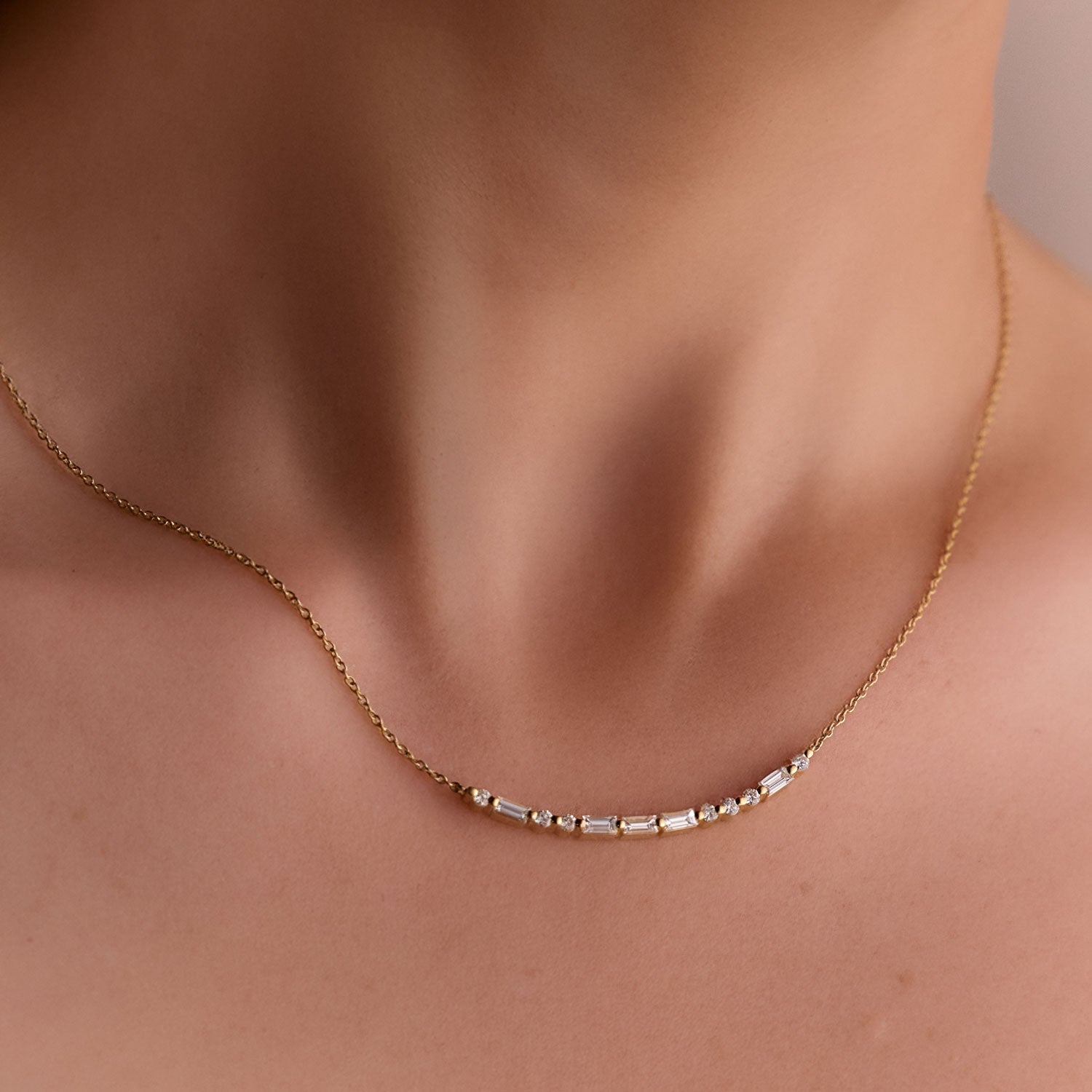 Faith Jewels 18k Yellow gold bar necklace with round and baguette diamonds spelling “LOVE” in Morse code.