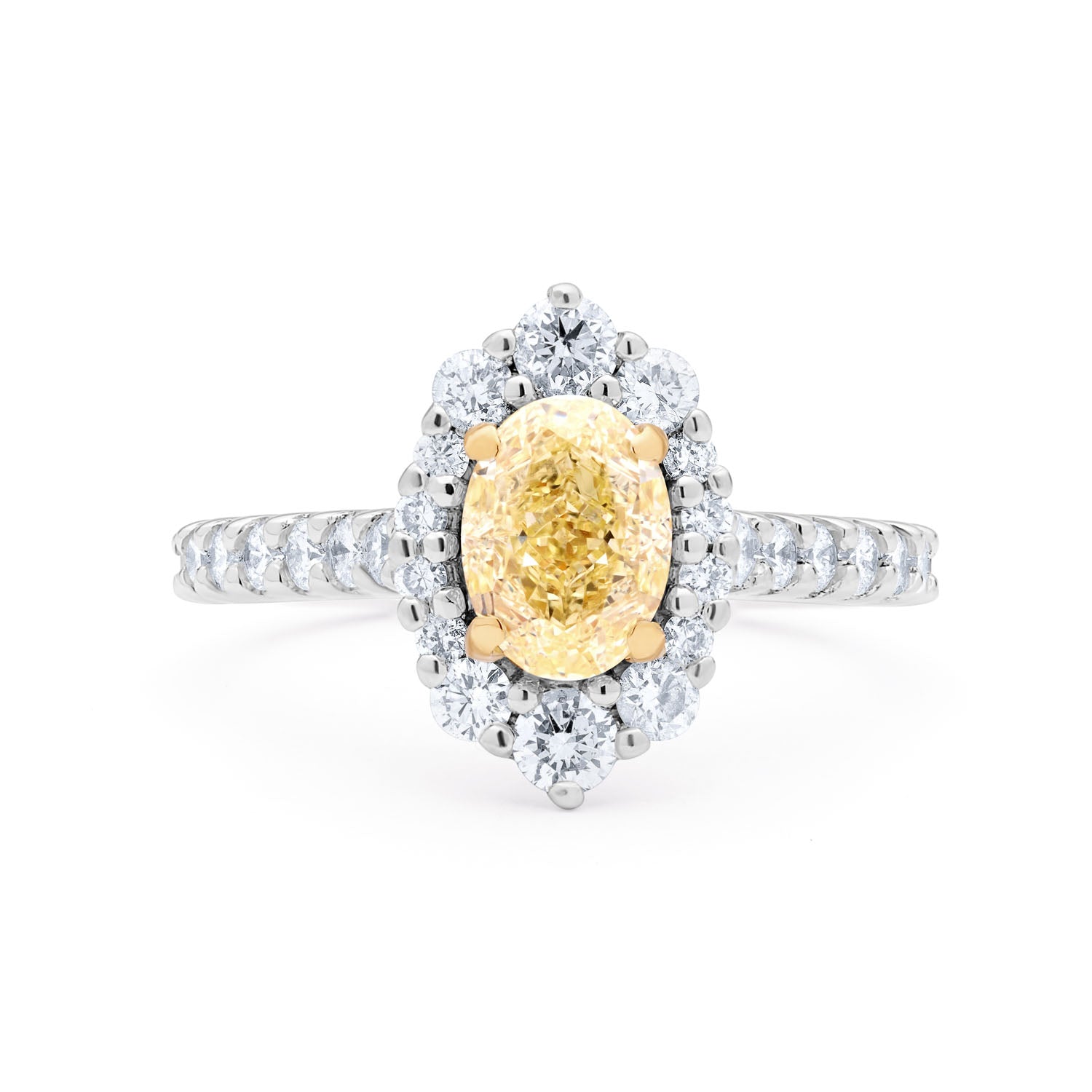 Faith Jewels Adeline yellow diamond engagement ring featuring an oval-cut yellow diamond with a graduating halo of round white diamonds, set in 18k white gold with a scallop-set diamond band