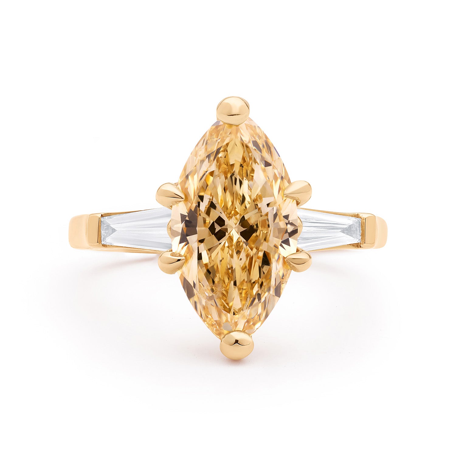 Faith Jewels Aimee Engagement Ring featuring a marquise-cut champagne diamond with tapered baguette side stones set in yellow gold
