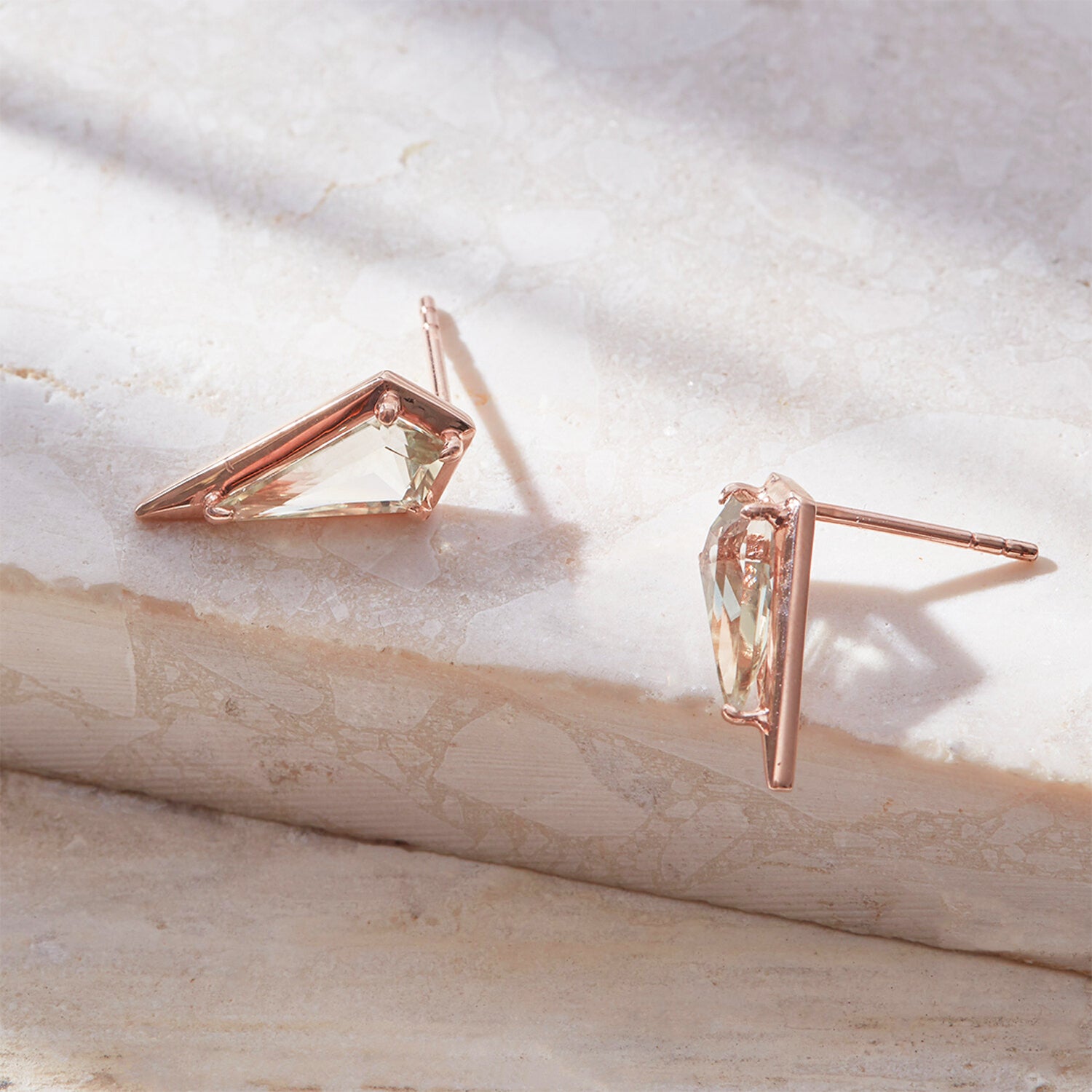 Rare kite-cut Turkish Csarite stud earrings in 9k rose gold, featuring natural color-change from green-gold to pinkish-purple