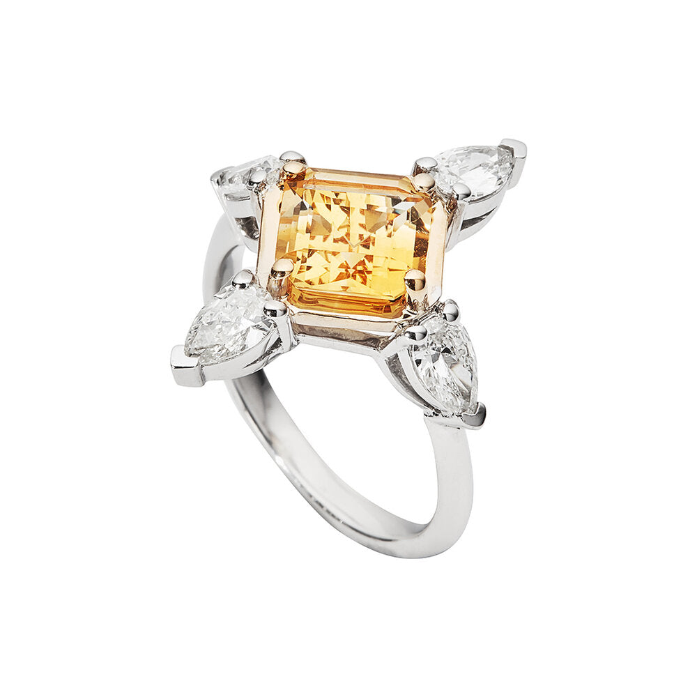 Faith Jewels Manifest Ring featuring a 2ct emerald-cut citrine framed by pear-cut diamonds at each corner, set in 18k white gold