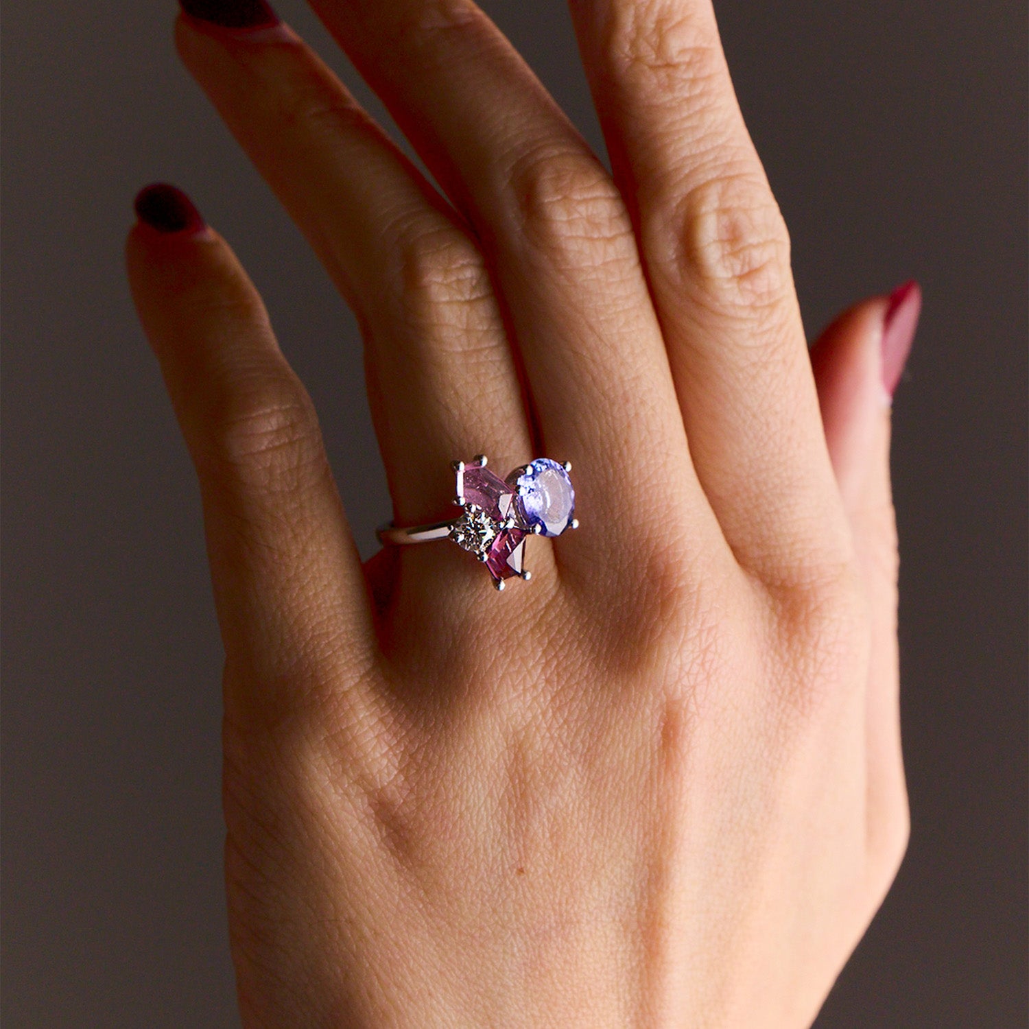 White gold ring from the Faith Jewels Bouquet Series featuring tanzanite, blush spinel, purple spinel, and an heirloom diamond