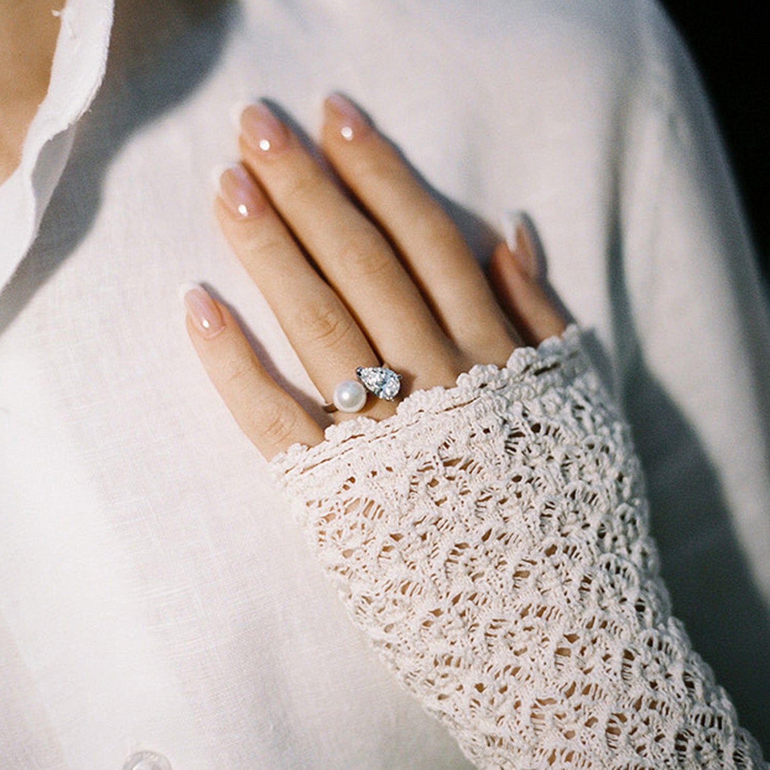 Unique Faith Jewels Toi Et Moi ring with a pear-cut diamond and hand-shucked pearl