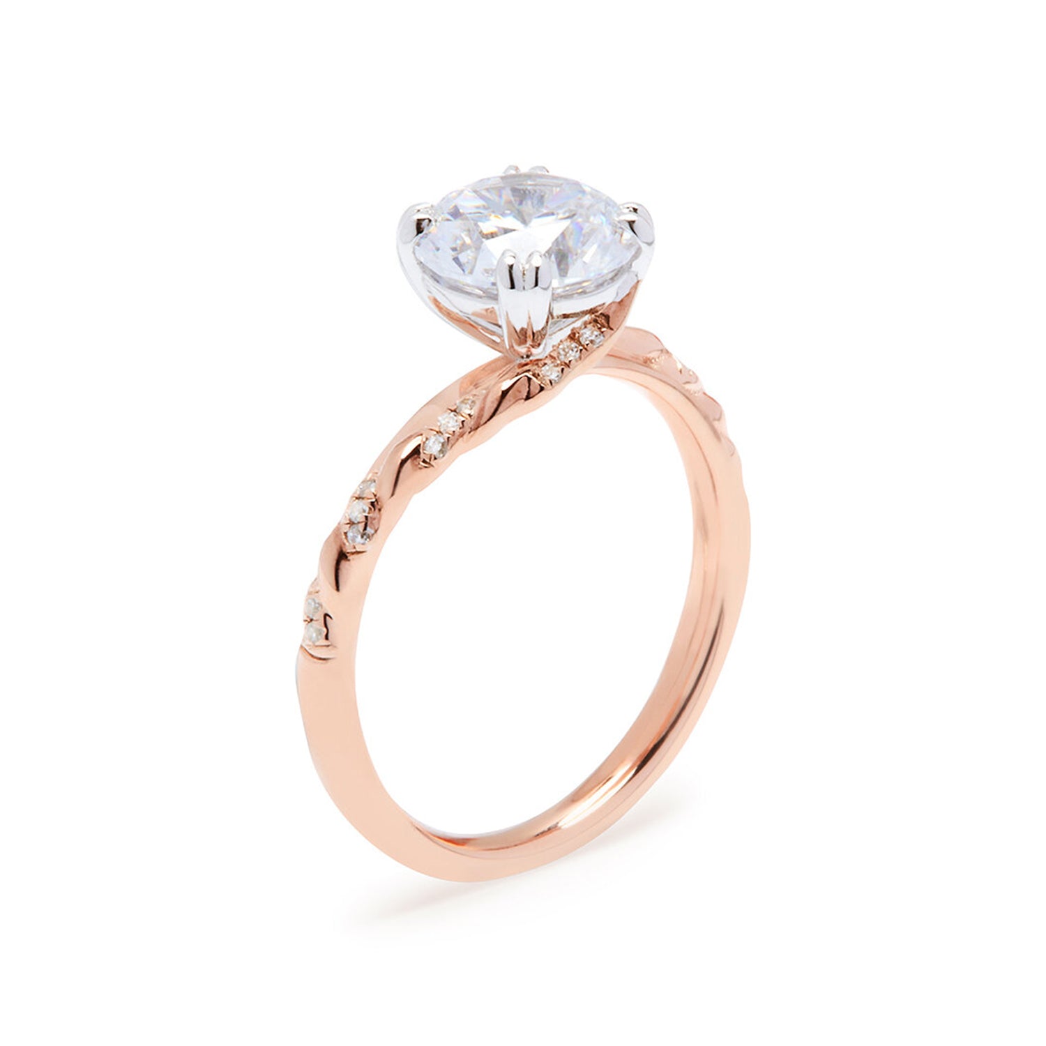 Faith Jewels True Lovers Knot engagement ring with a knotted rope-like sculpted setting entwining the feature diamond in rose gold band