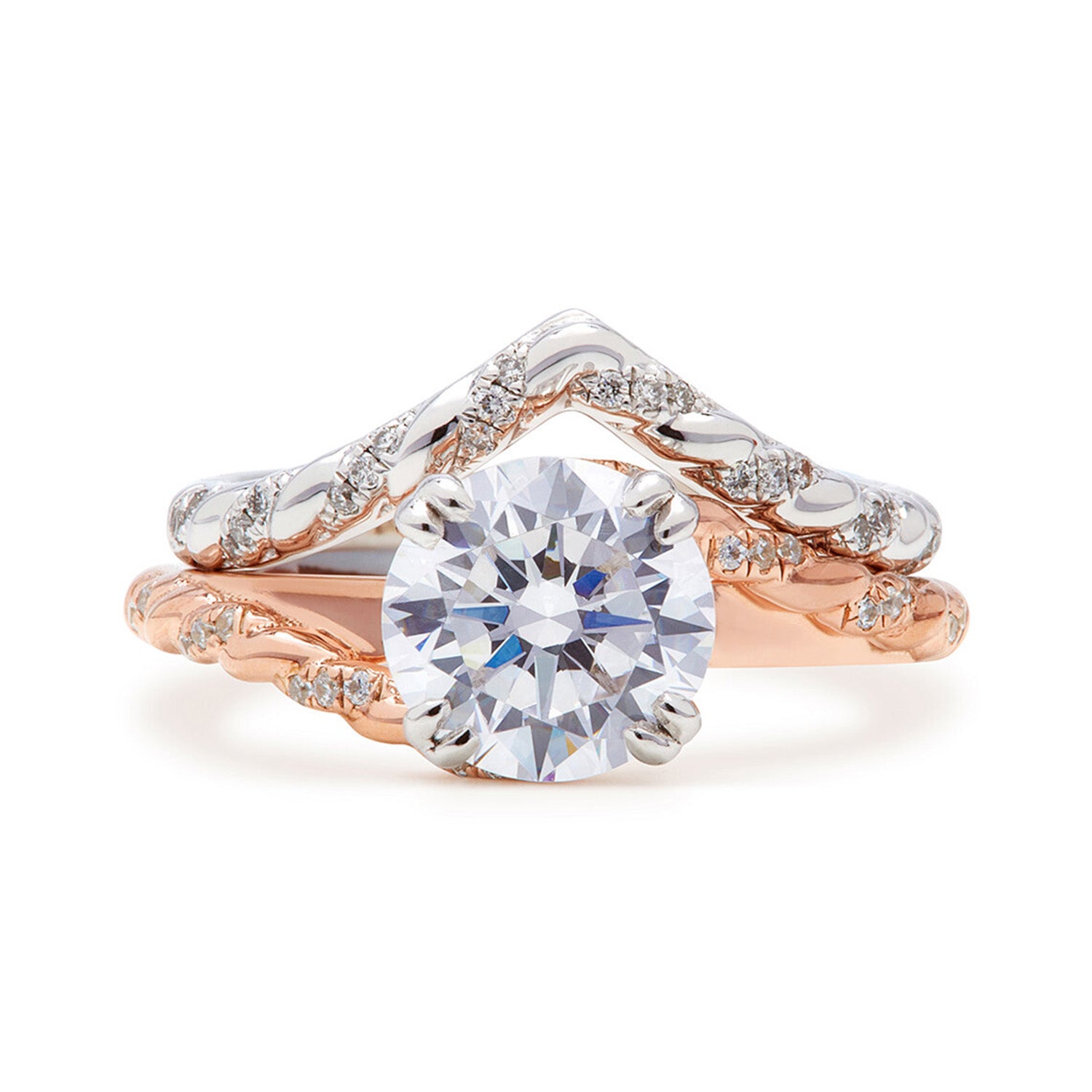 Faith Jewels True Lovers Knot engagement ring with a knotted rope-like sculpted setting entwining the feature diamond in rose gold band, stacked with matching V-Curve wedding band in white gold