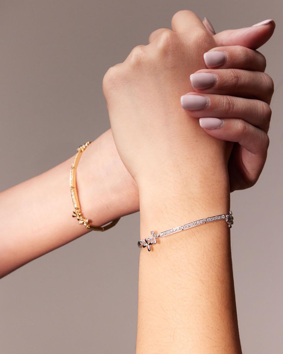 Wildflowers Diamond Bracelet in 18k white and yellow gold worn on model.