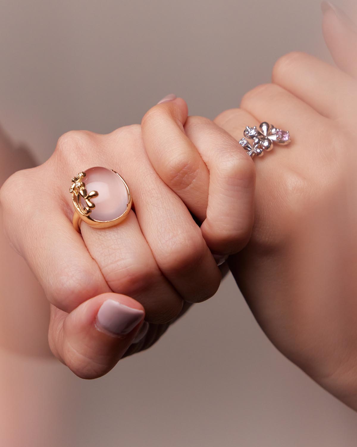 Dome Rose Quartz and Diamond Ring in 9k yellow gold with 15ct rose quartz and 0.05ct diamond accents, worn on model.