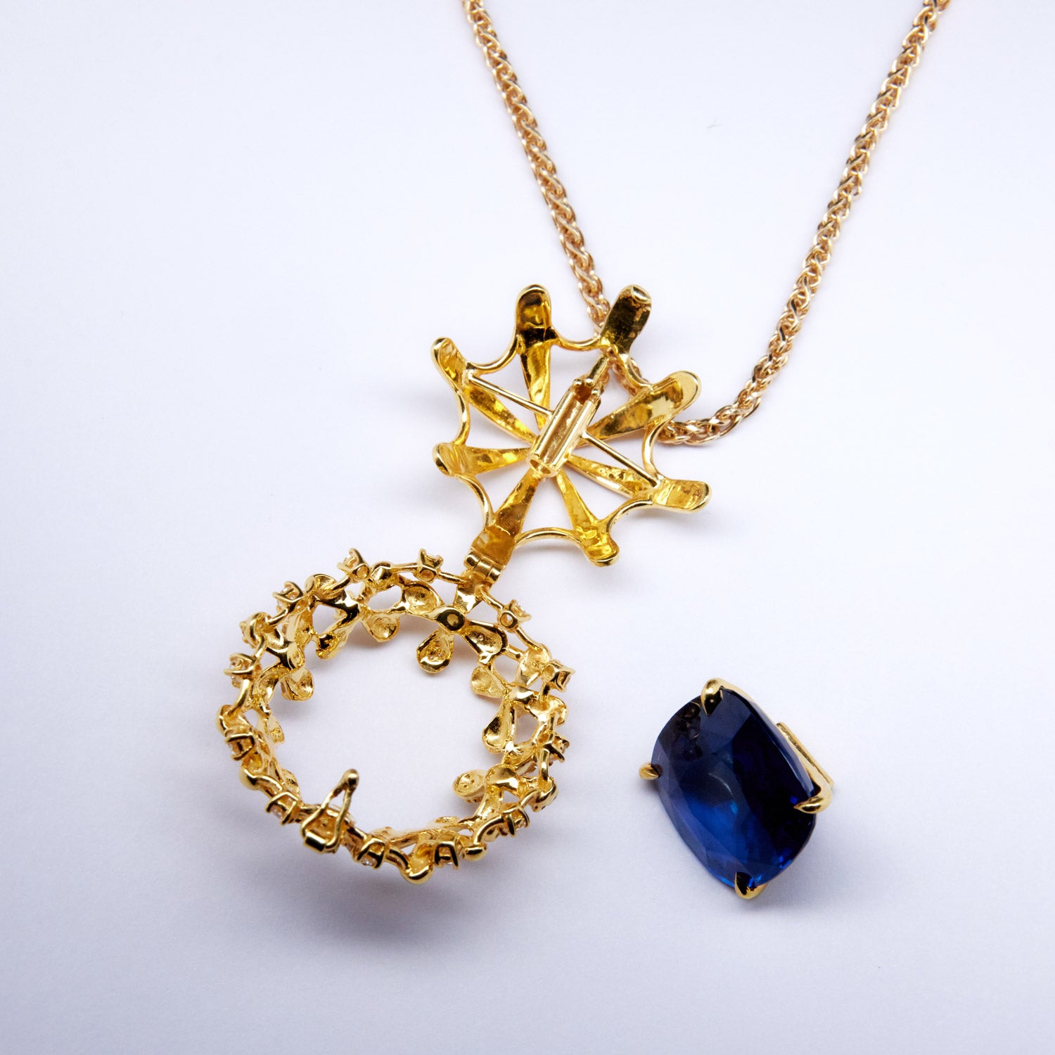 Yellow gold Grandiflora set with a detachable sapphire, diamond floral wreath pendant on a 45cm chain