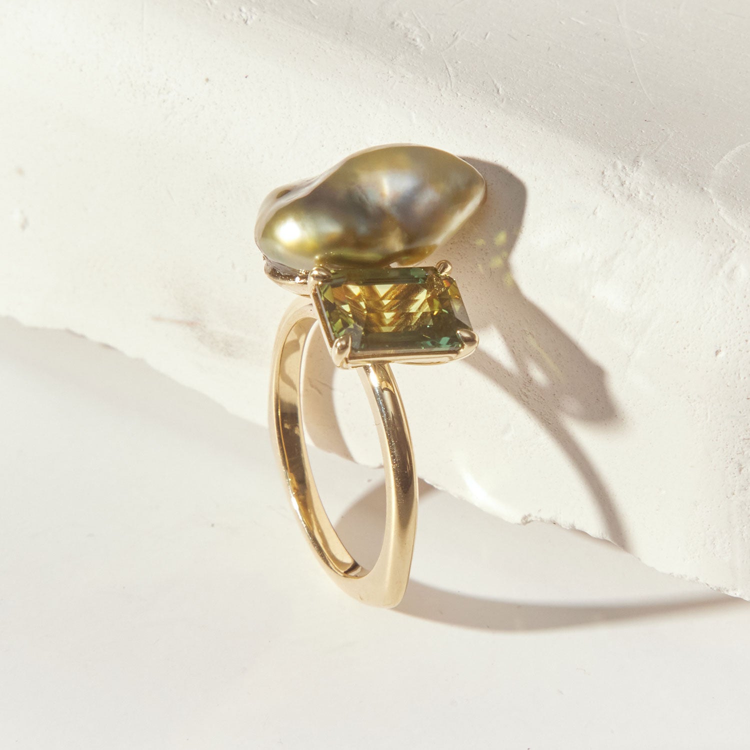 Faith Jewels Toi et Moi ring featuring a baroque pearl and tourmaline set in an 18k yellow gold band