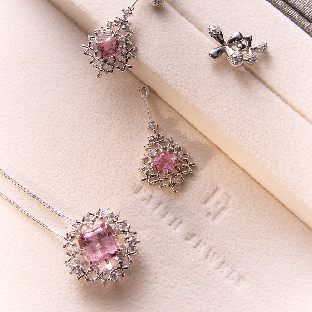 Faith Jewels Pink tourmaline pendant and earrings set in 18k white gold with diamond floral accents.