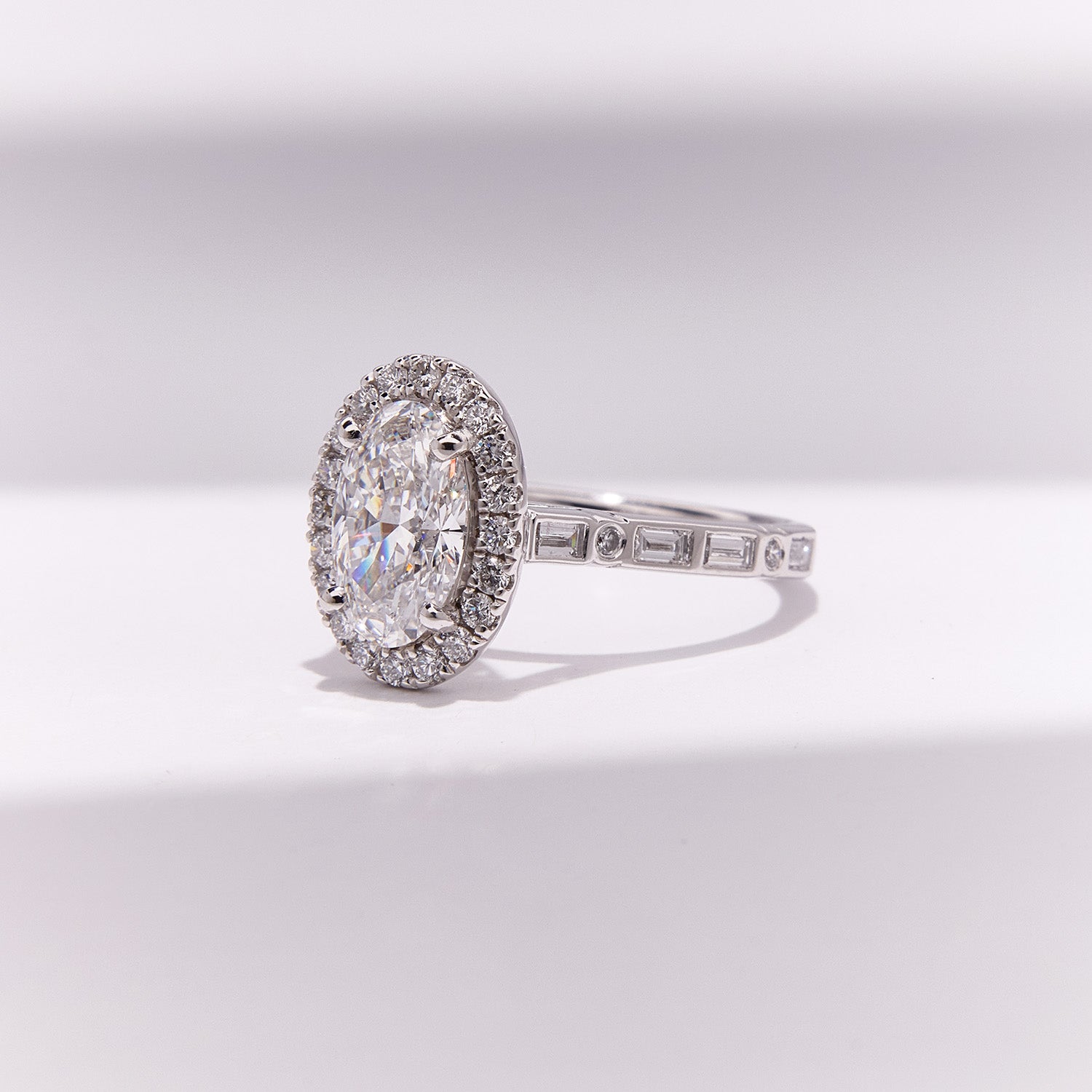 Bespoke Morse Code engagement ring with diamonds spelling initials "Q" and "N", romantic and elegant design.