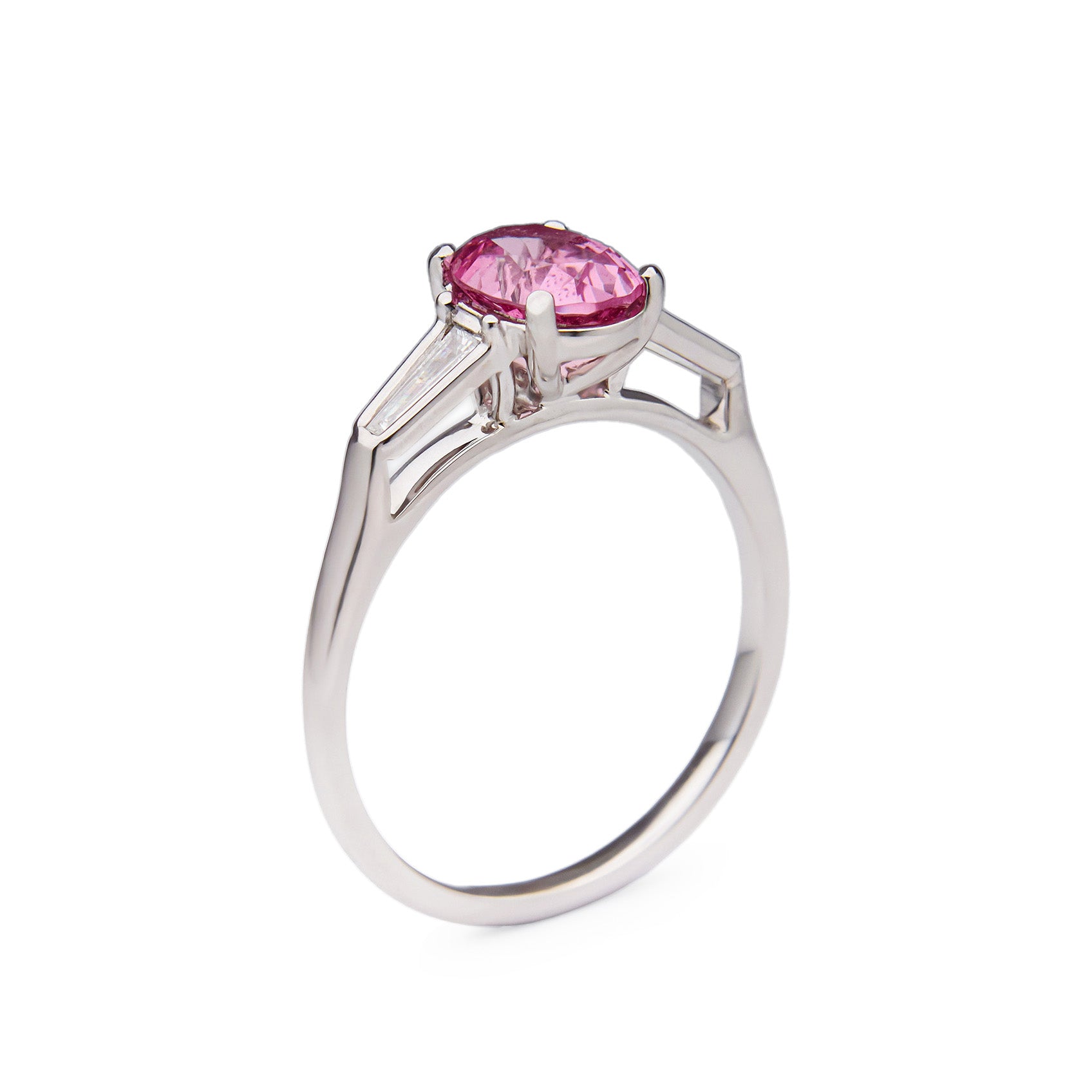 Elegant Pink Spinel Ring with 0.90 carat spinel and tapered baguette diamond accents in 18k white gold