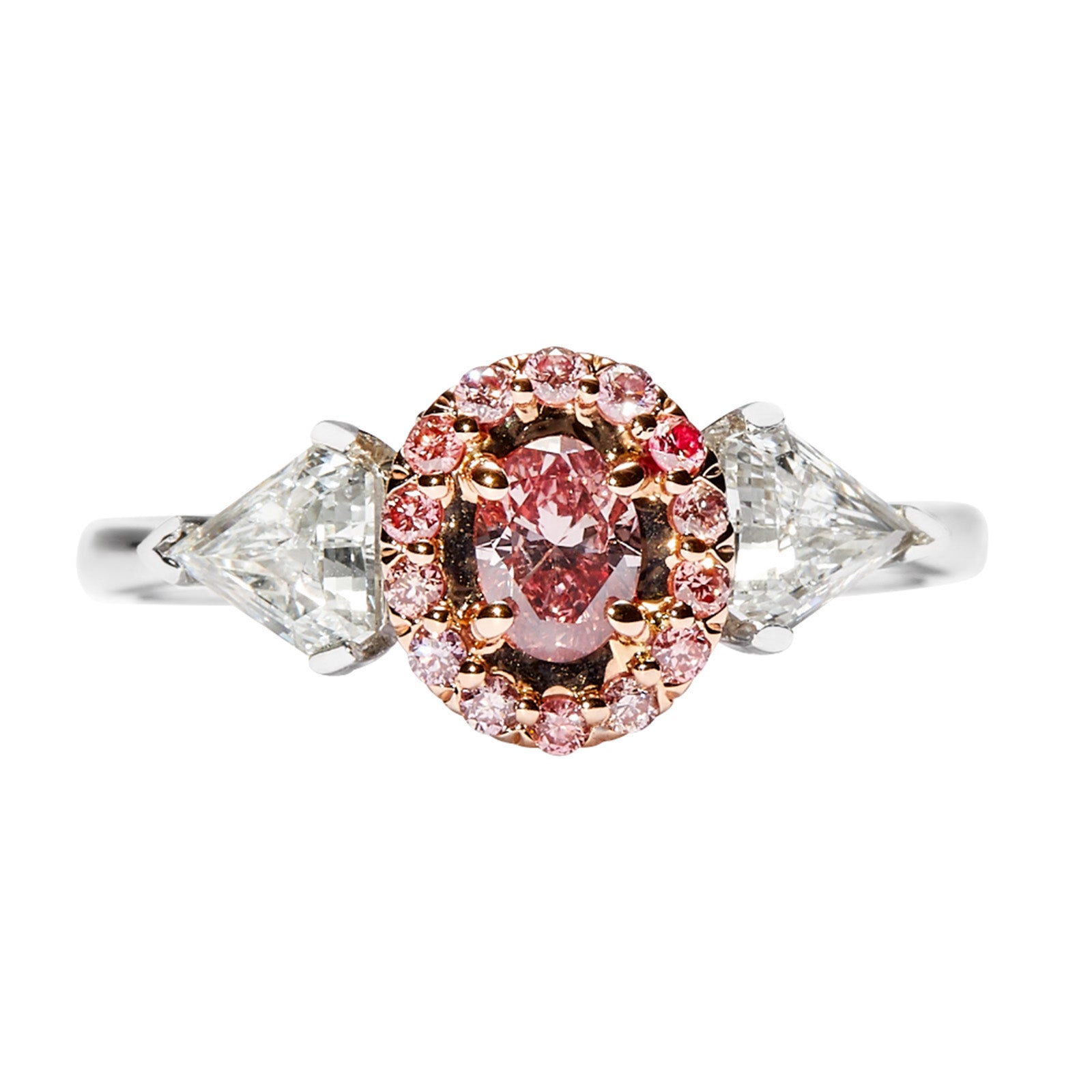 Rose diamond engagement Ring with Australian Argyle pink diamond, halo of pink diamonds, and kite-shaped white diamonds